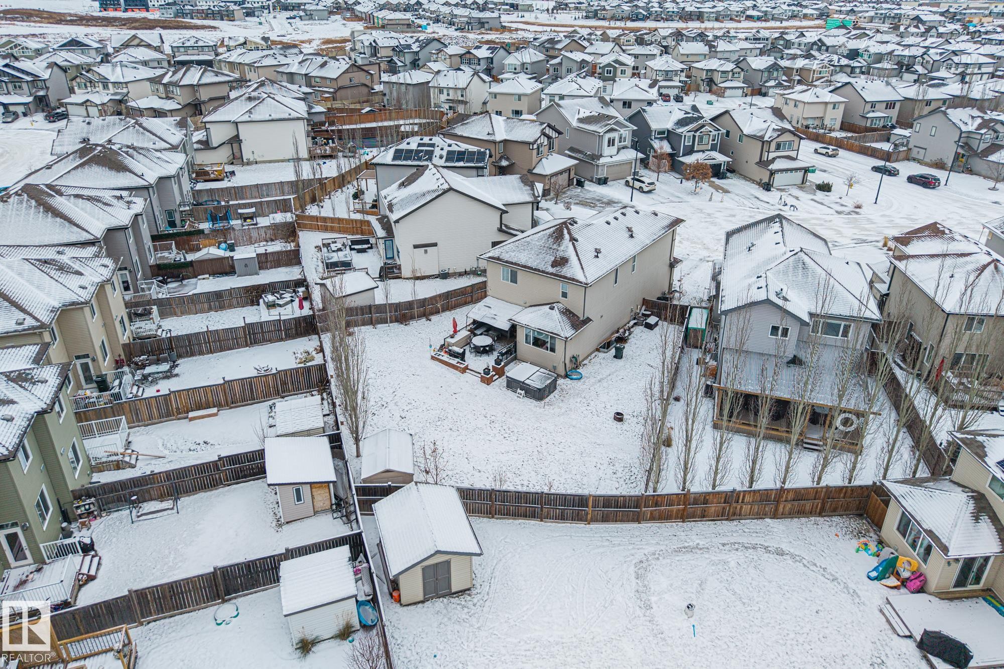 Snowy aerial view featuring a residential view - 14 Spring Bay, Spruce Grove, AB - Outdoor