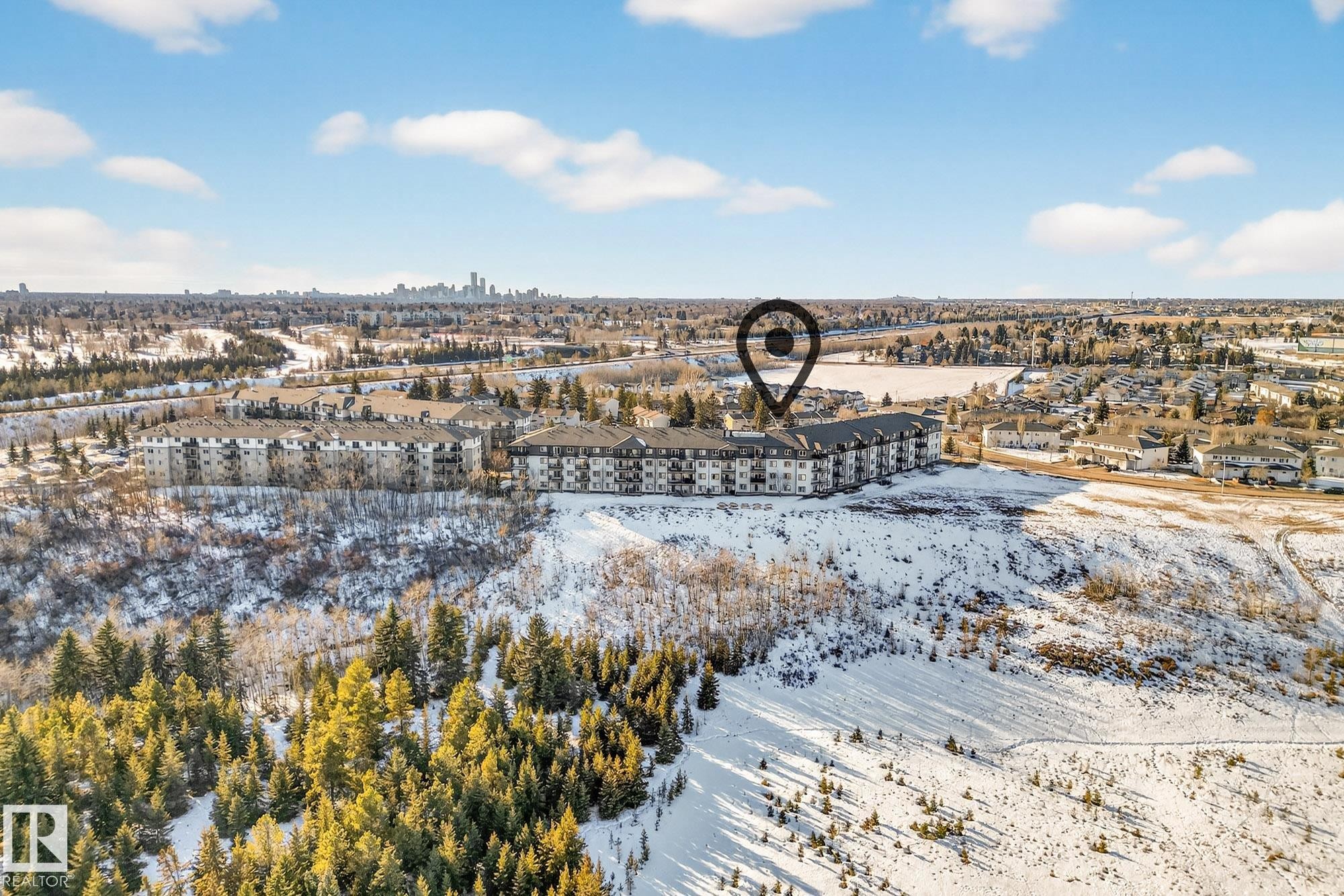 View of snowy aerial view - 357 1196 Hyndman Road, Edmonton, AB - Outdoor With View