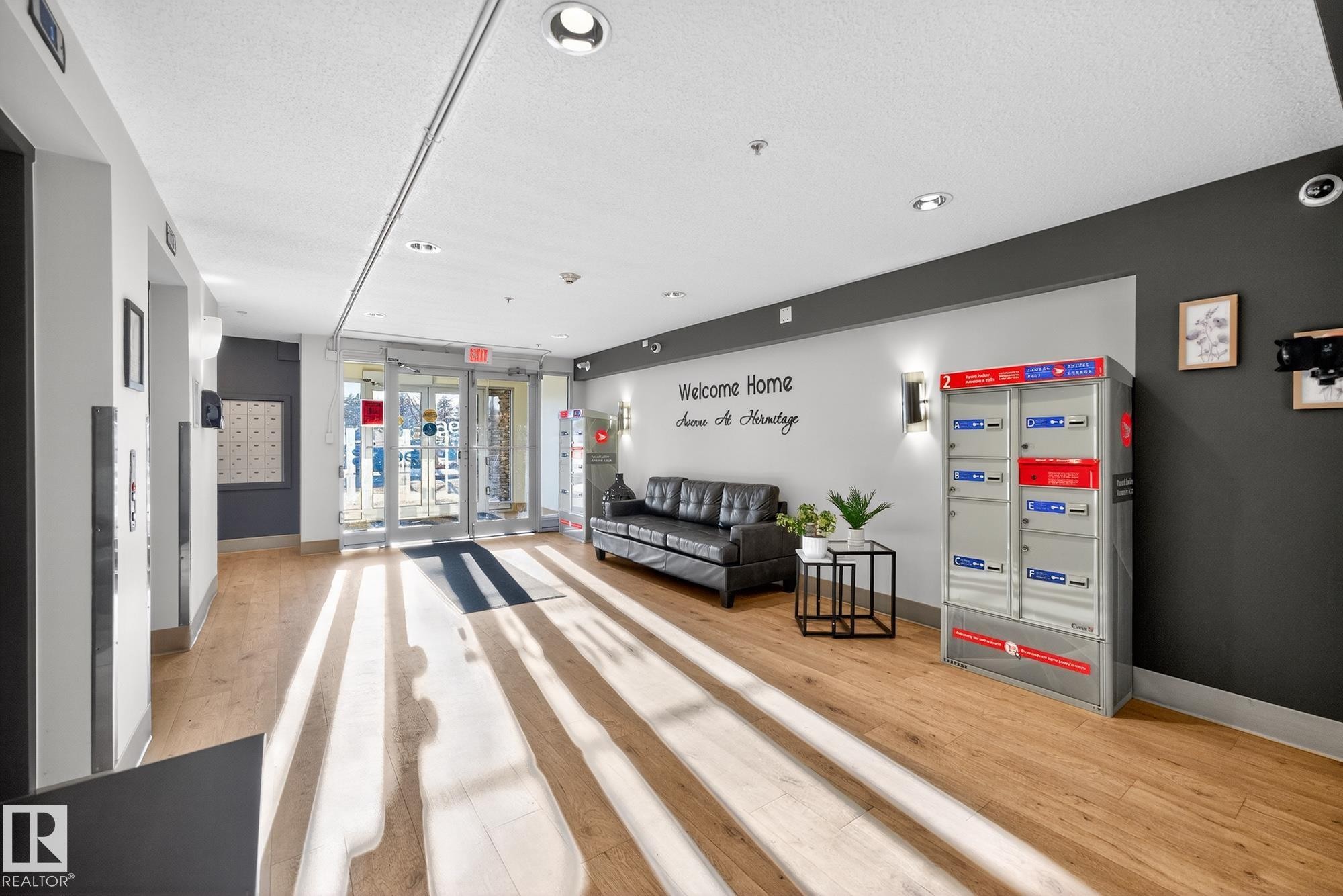 Building lobby featuring a textured ceiling and recessed lighting - 357 1196 Hyndman Road, Edmonton, AB - Indoor