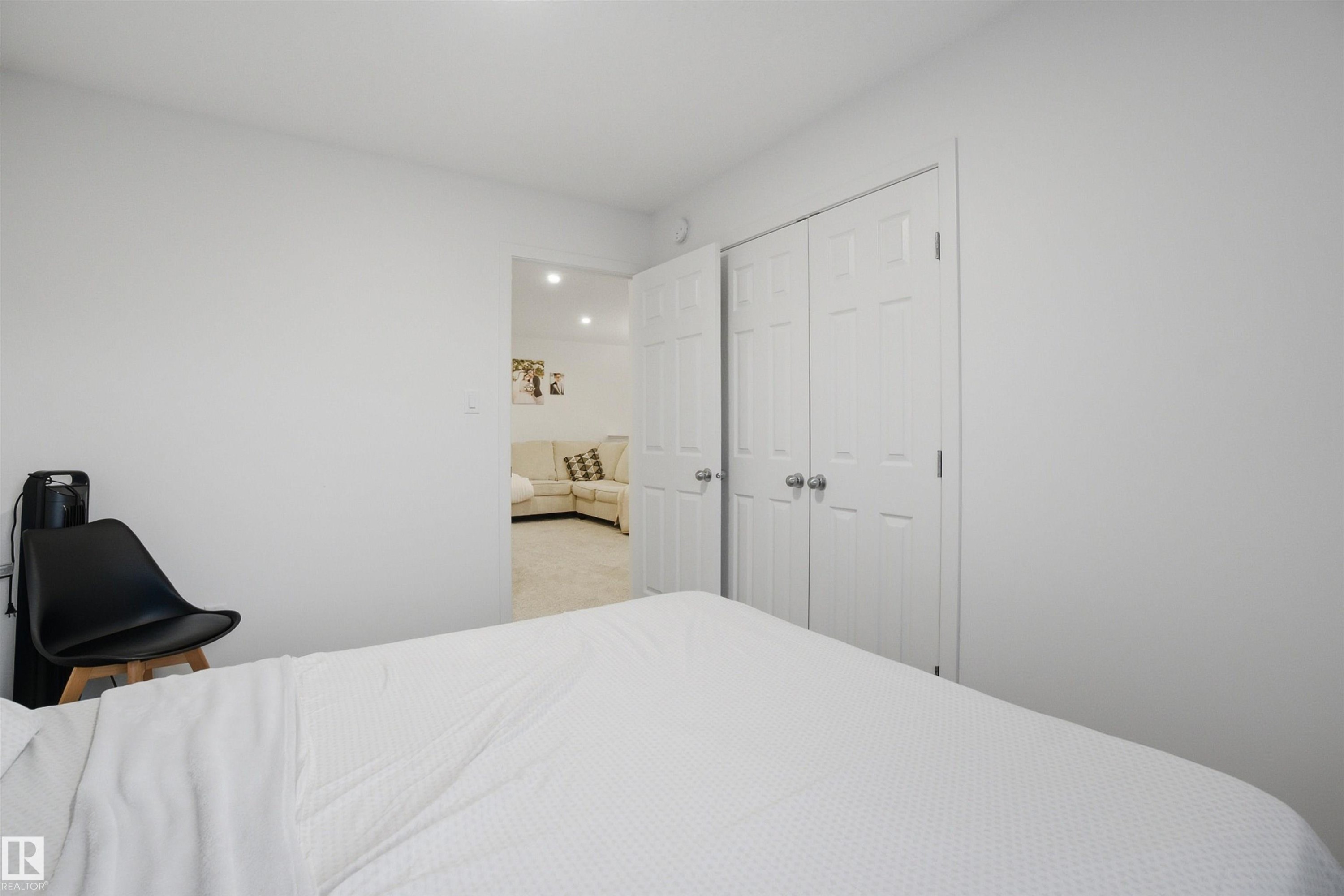 Bedroom featuring a closet - 9882 225A St Nw, Edmonton, AB - Indoor Photo Showing Bedroom