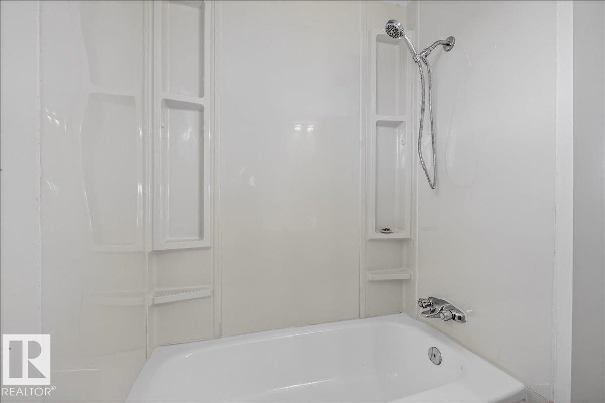 Bathroom with shower / washtub combination - 133 Habitat Crescent, Edmonton, AB - Indoor Photo Showing Bathroom
