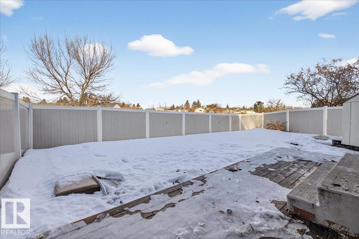 Fenced backyard featuring a patio - 133 Habitat Crescent, Edmonton, AB - Outdoor With Backyard