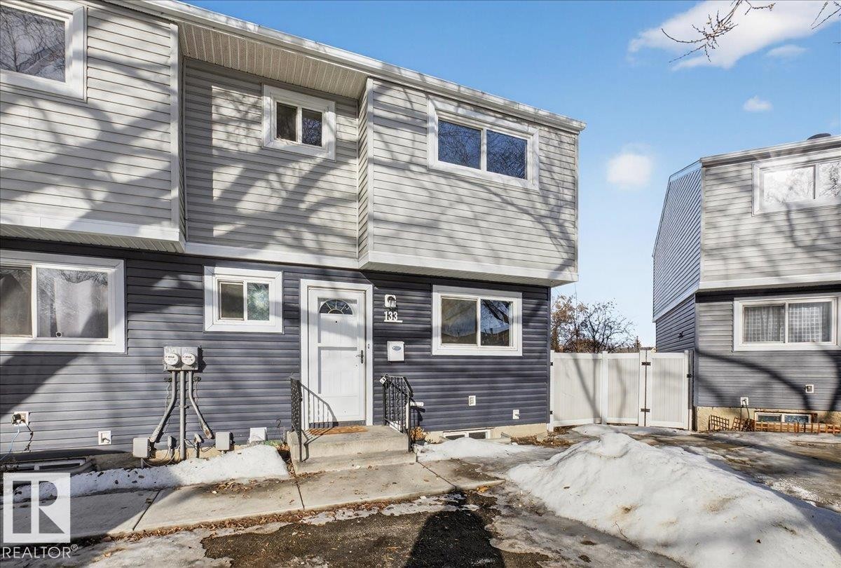 Rear view of house with a gate - 133 Habitat Crescent, Edmonton, AB - Outdoor With Facade