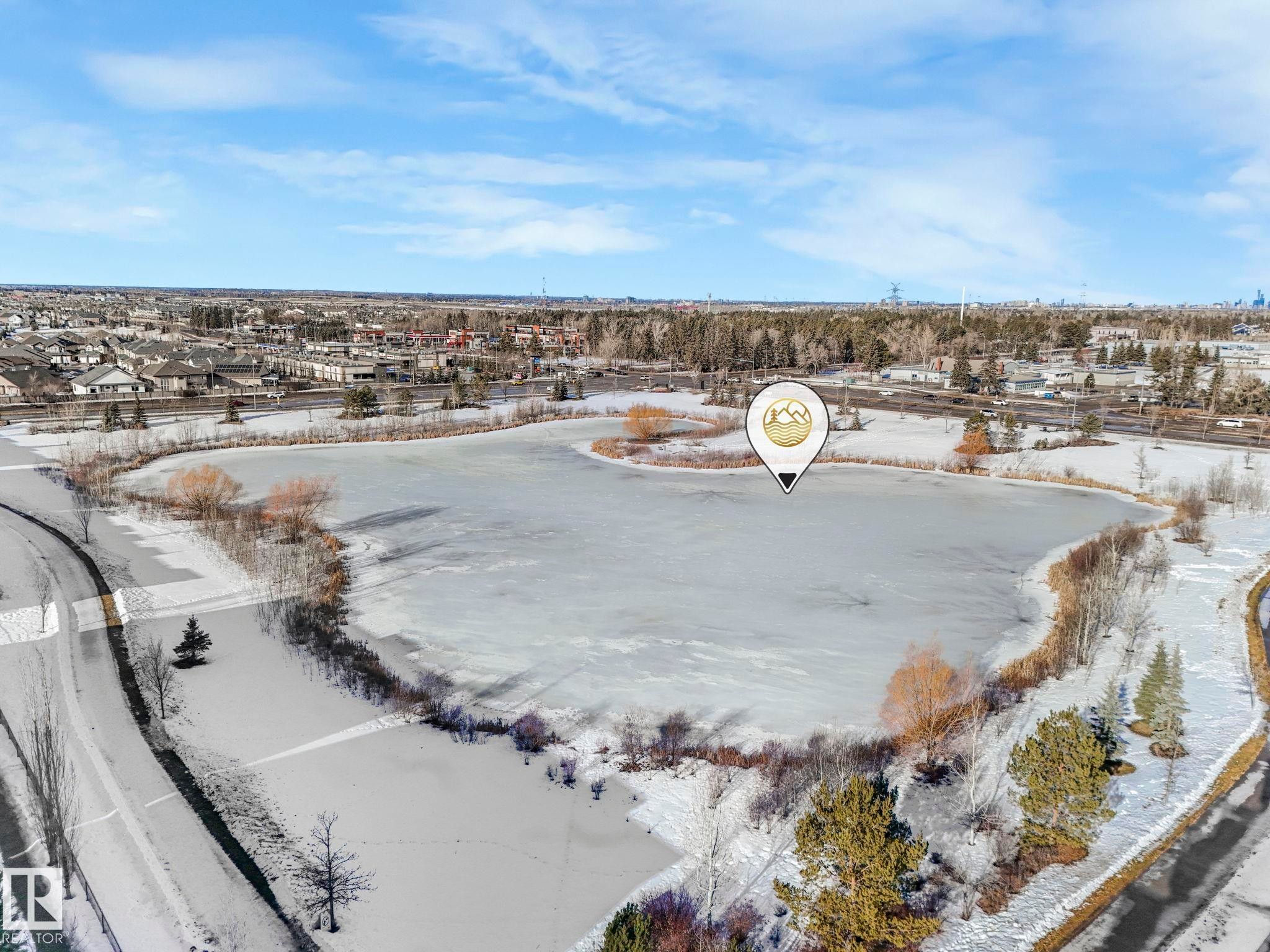 Snowy aerial view with a residential view - 91 603 Watt Boulevard, Edmonton, AB - Outdoor With View