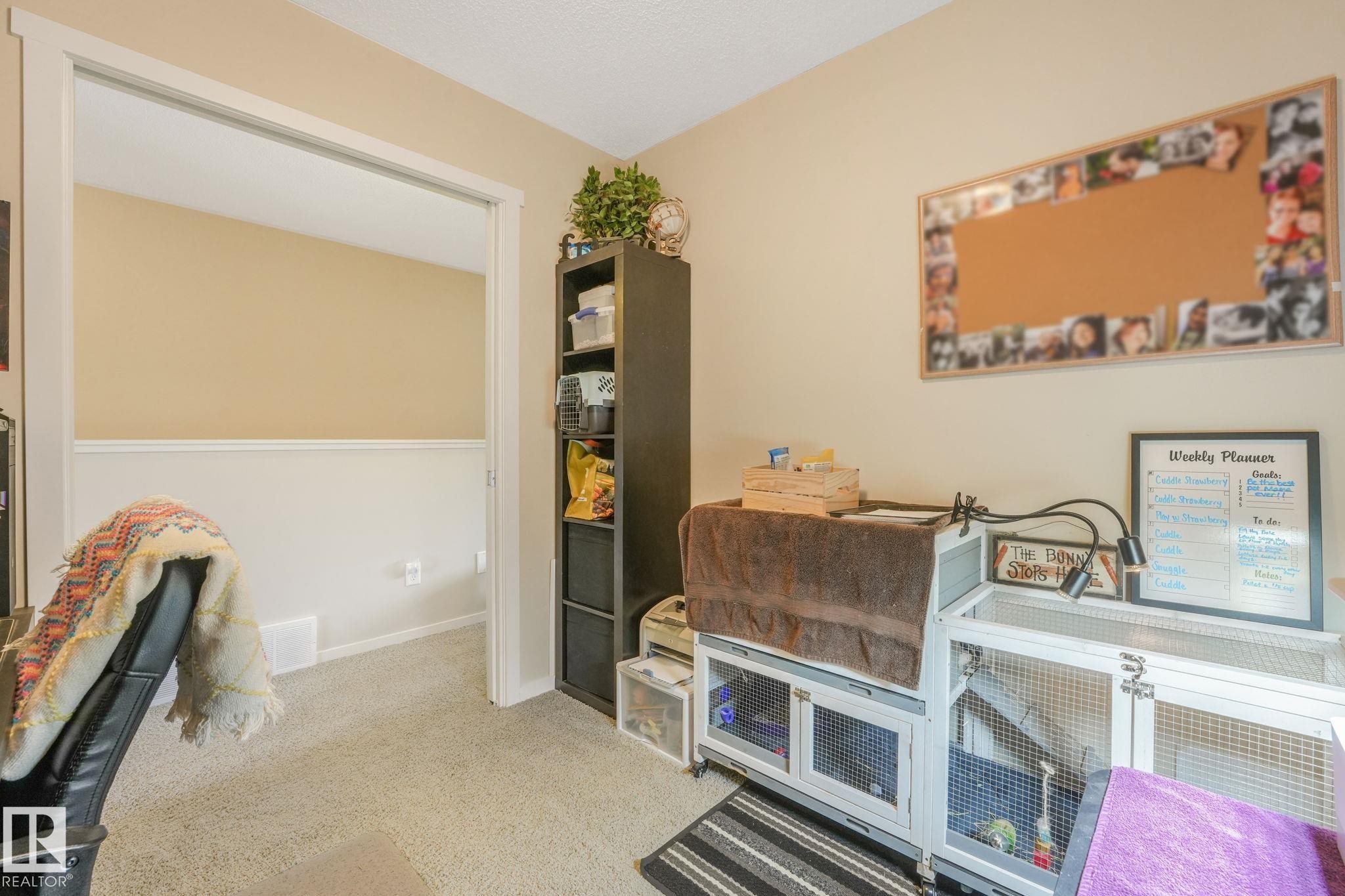 Home office featuring carpet floors and baseboards - 91 603 Watt Boulevard, Edmonton, AB - Indoor
