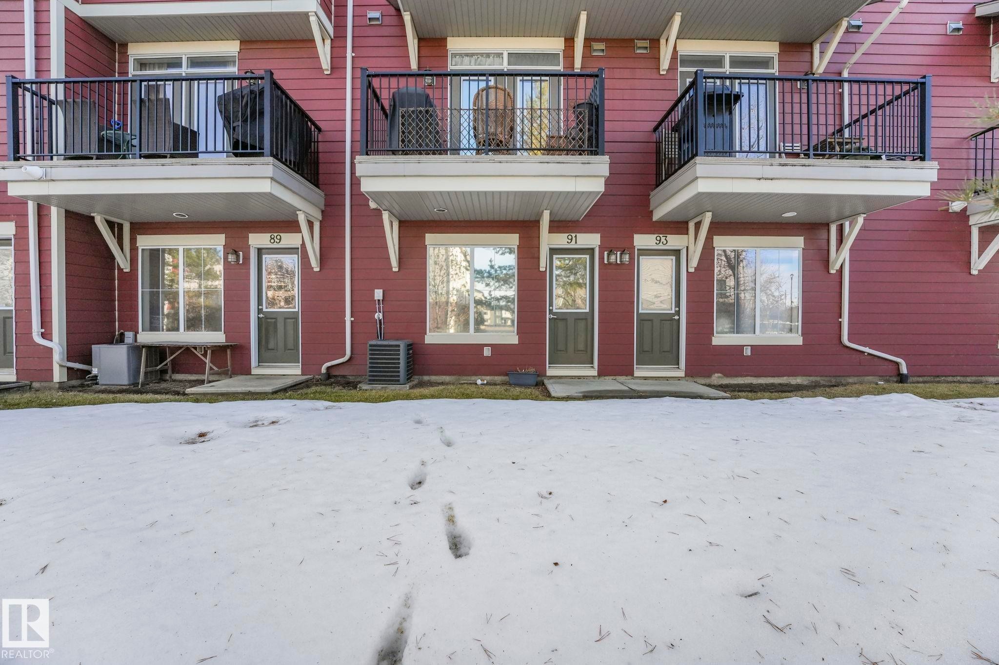 Snow covered property featuring a balcony - 91 603 Watt Boulevard, Edmonton, AB - Outdoor With Balcony