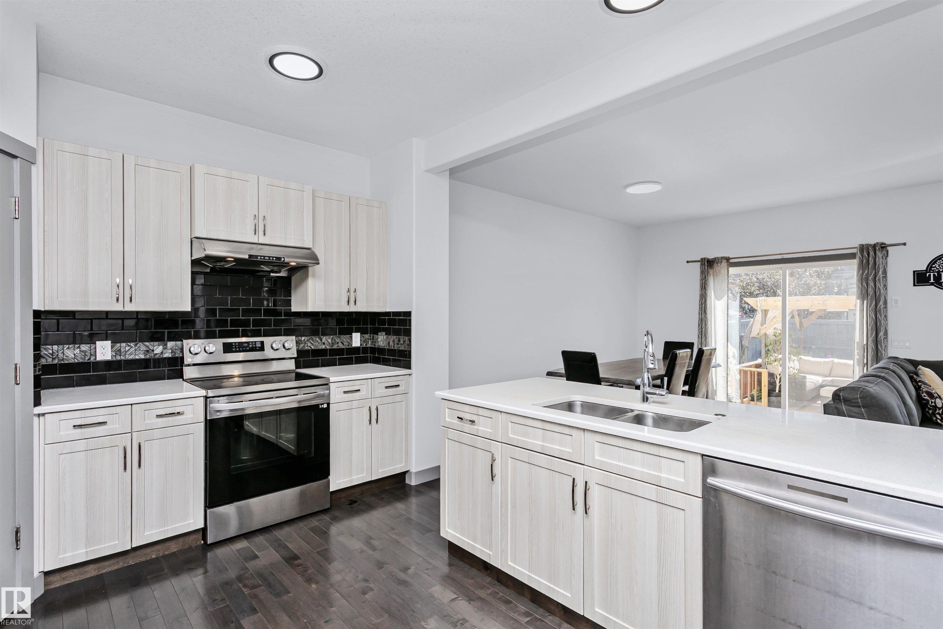 7703 Getty Wynd, Edmonton, AB - Indoor Photo Showing Kitchen With Double Sink