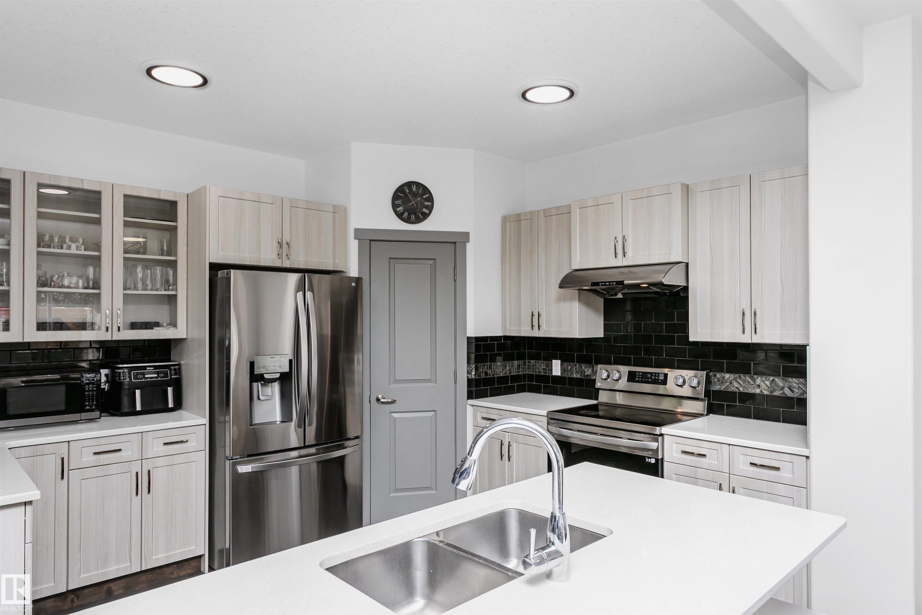 7703 Getty Wynd, Edmonton, AB - Indoor Photo Showing Kitchen With Stainless Steel Kitchen With Double Sink