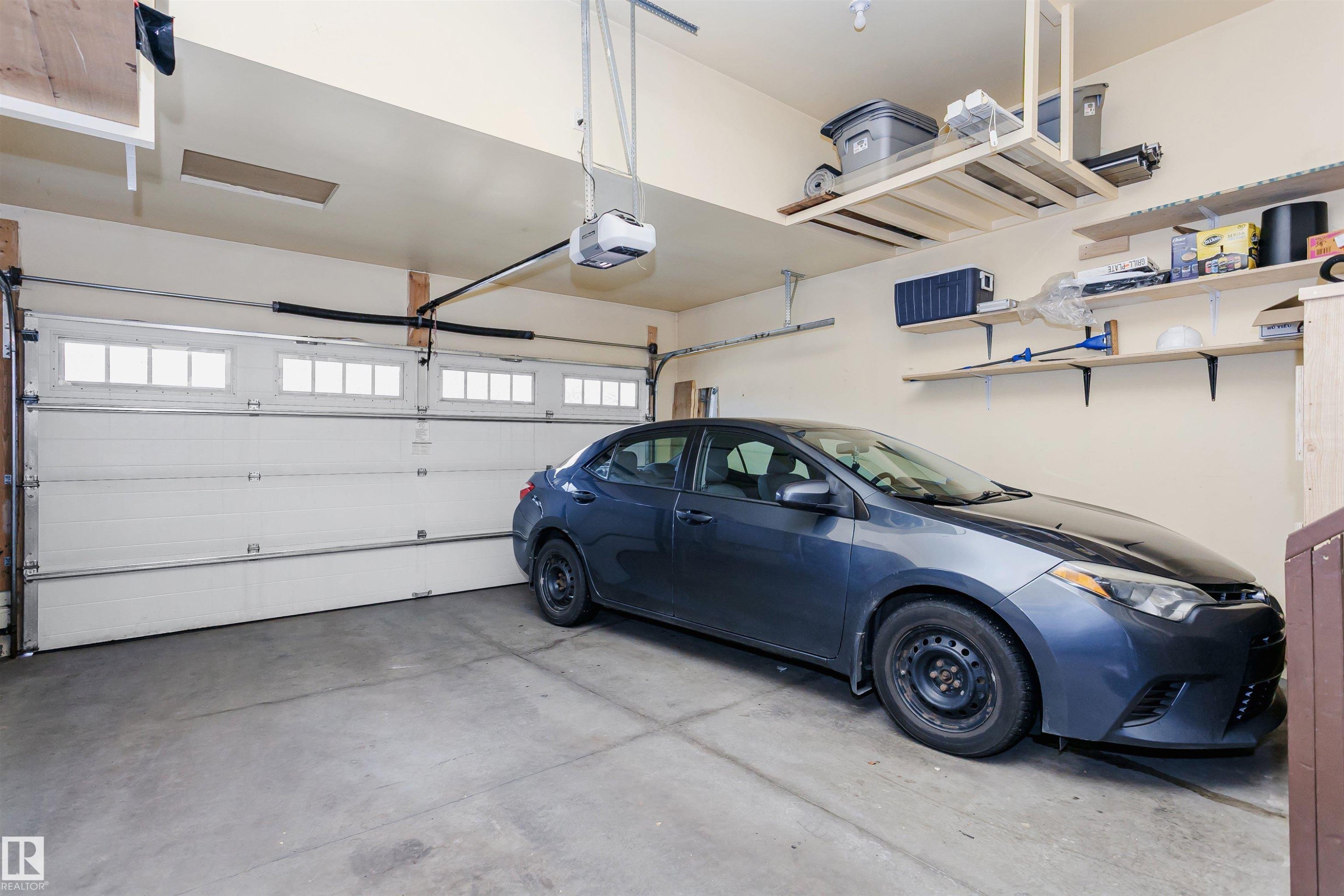 7703 Getty Wynd, Edmonton, AB - Indoor Photo Showing Garage