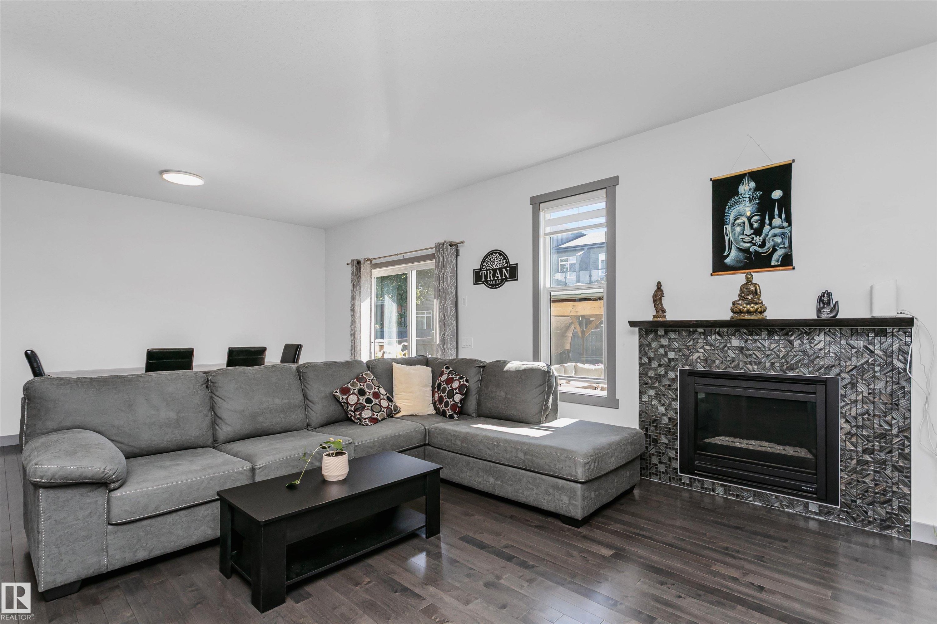 7703 Getty Wynd, Edmonton, AB - Indoor Photo Showing Living Room With Fireplace