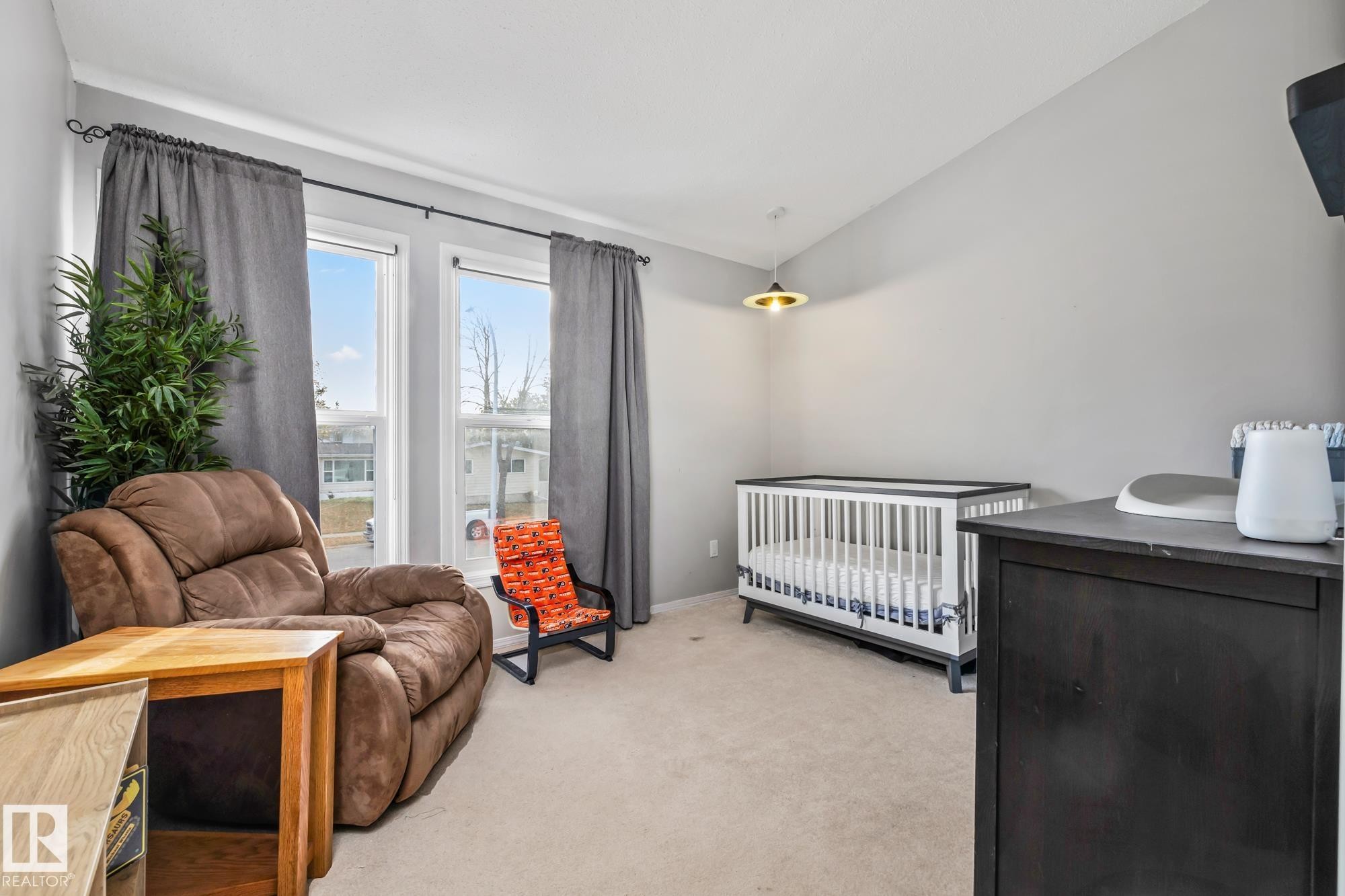 Bedroom featuring light colored carpet and lofted ceiling - 11 Grandview Ridge, St. Albert, AB - Indoor Photo Showing Bedroom