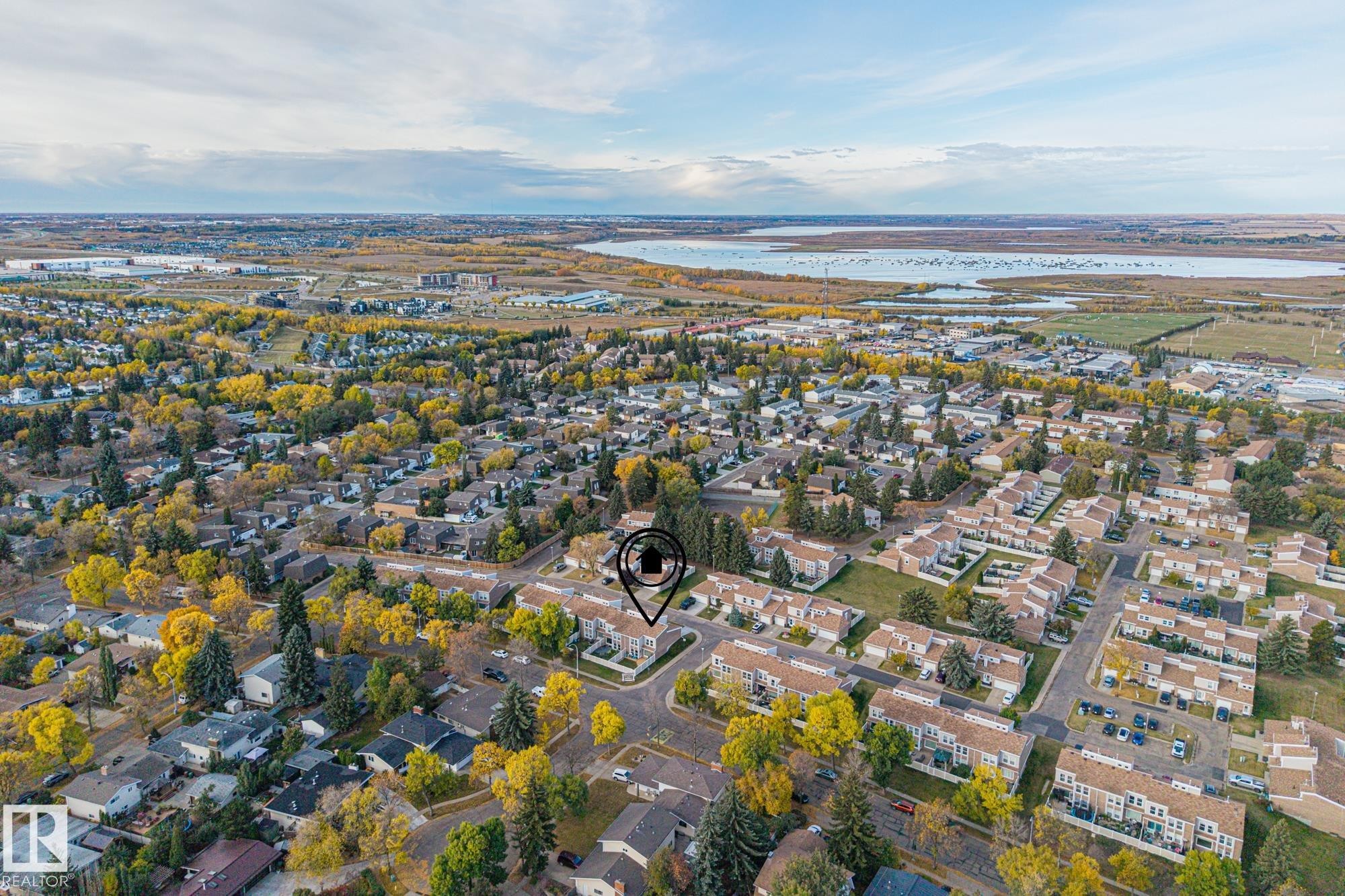 Aerial overview of property's location with nearby suburban area and a nearby body of water - 11 Grandview Ridge, St. Albert, AB - Outdoor With View