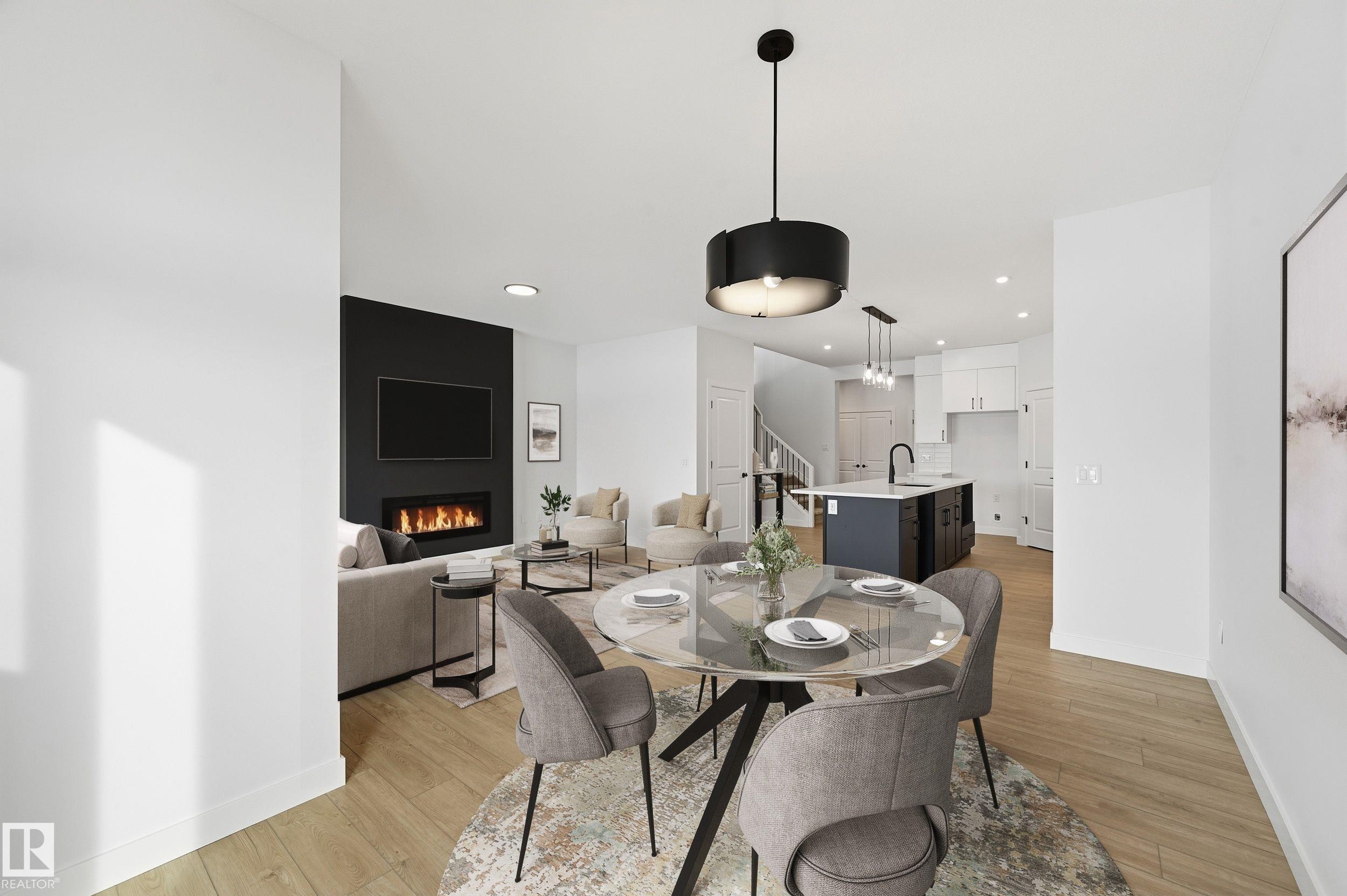 15 Gable Common, Spruce Grove, AB - Indoor Photo Showing Dining Room With Fireplace