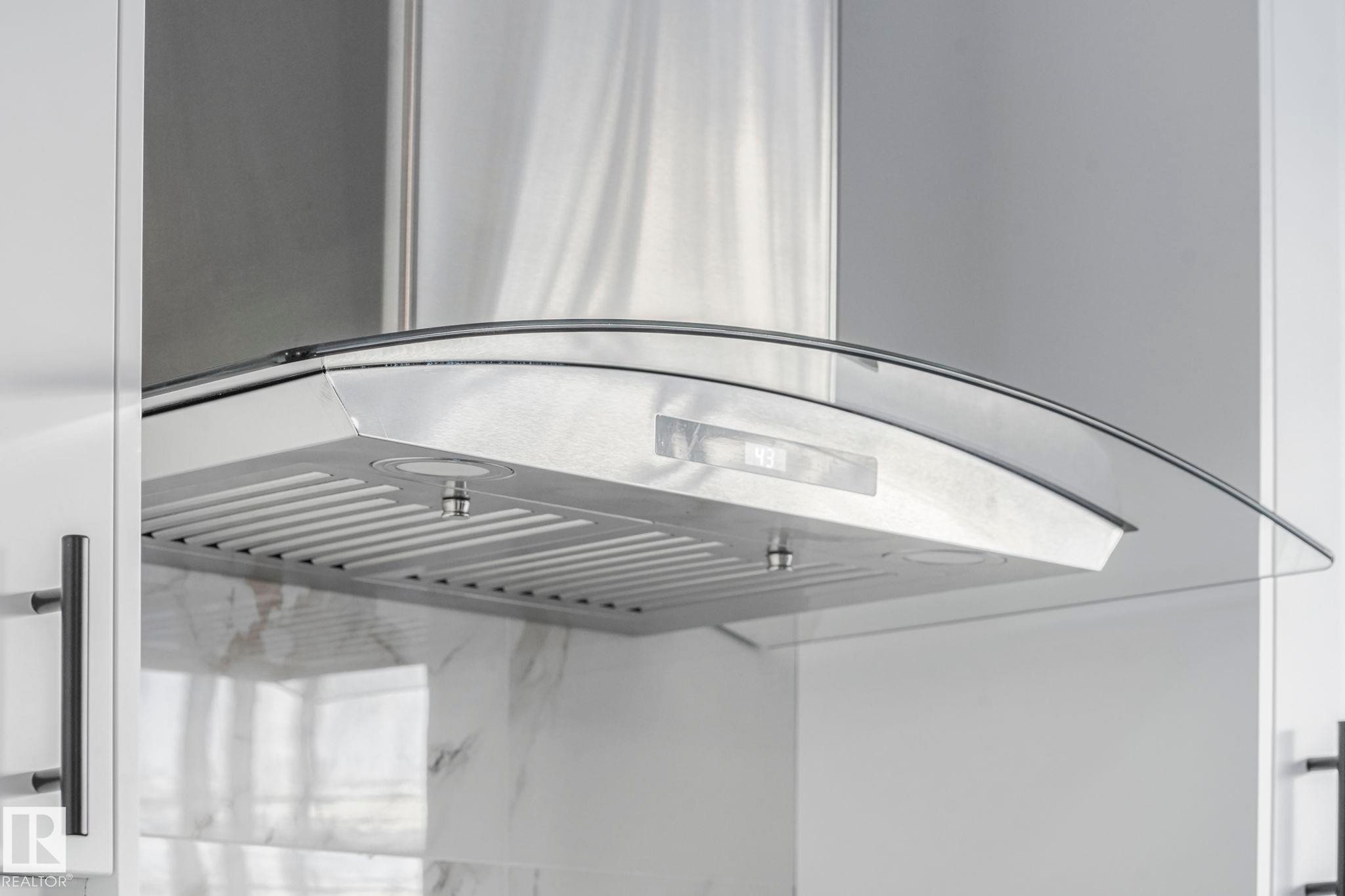 Detailed view of extractor fan - 6007 95 Avenue, Edmonton, AB - Indoor Photo Showing Other Room