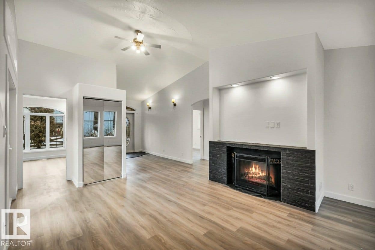 5220 47A Avenue, Rural Lac Ste. Anne County, AB - Indoor Photo Showing Other Room With Fireplace