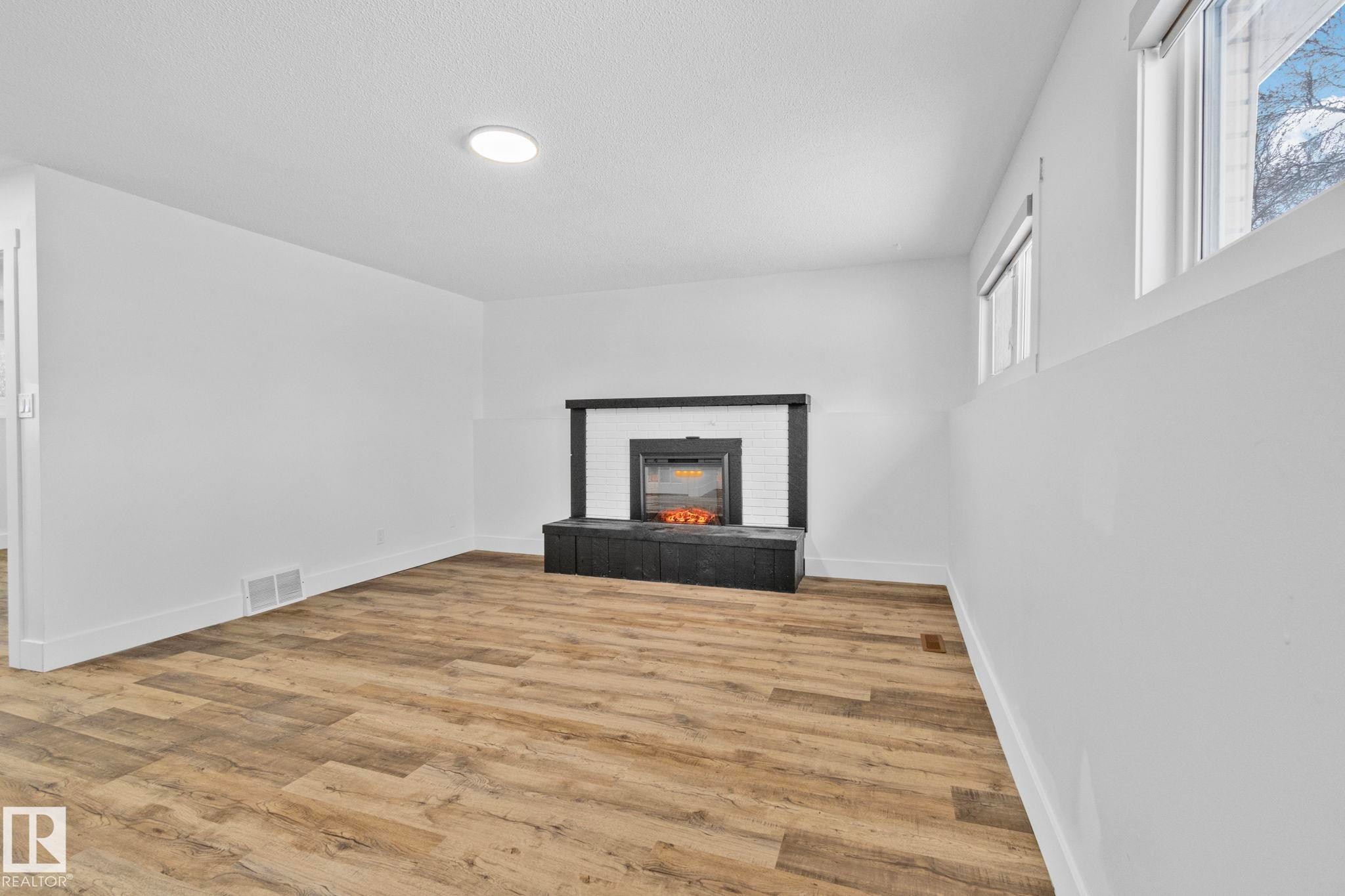 16 Larose Drive, St. Albert, AB - Indoor With Fireplace
