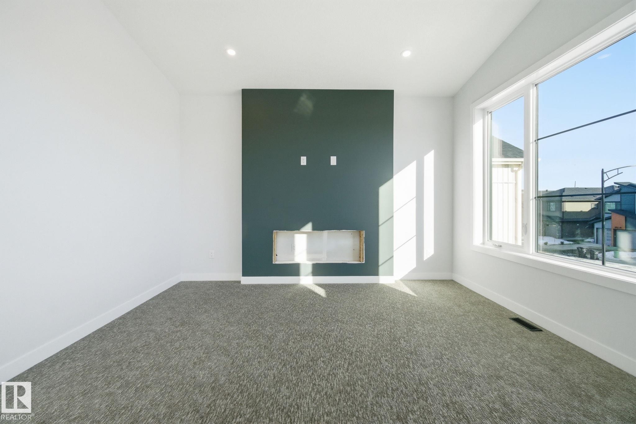 Spare room featuring carpet floors and recessed lighting - 17108 2 Street, Edmonton, AB - Indoor Photo Showing Other Room
