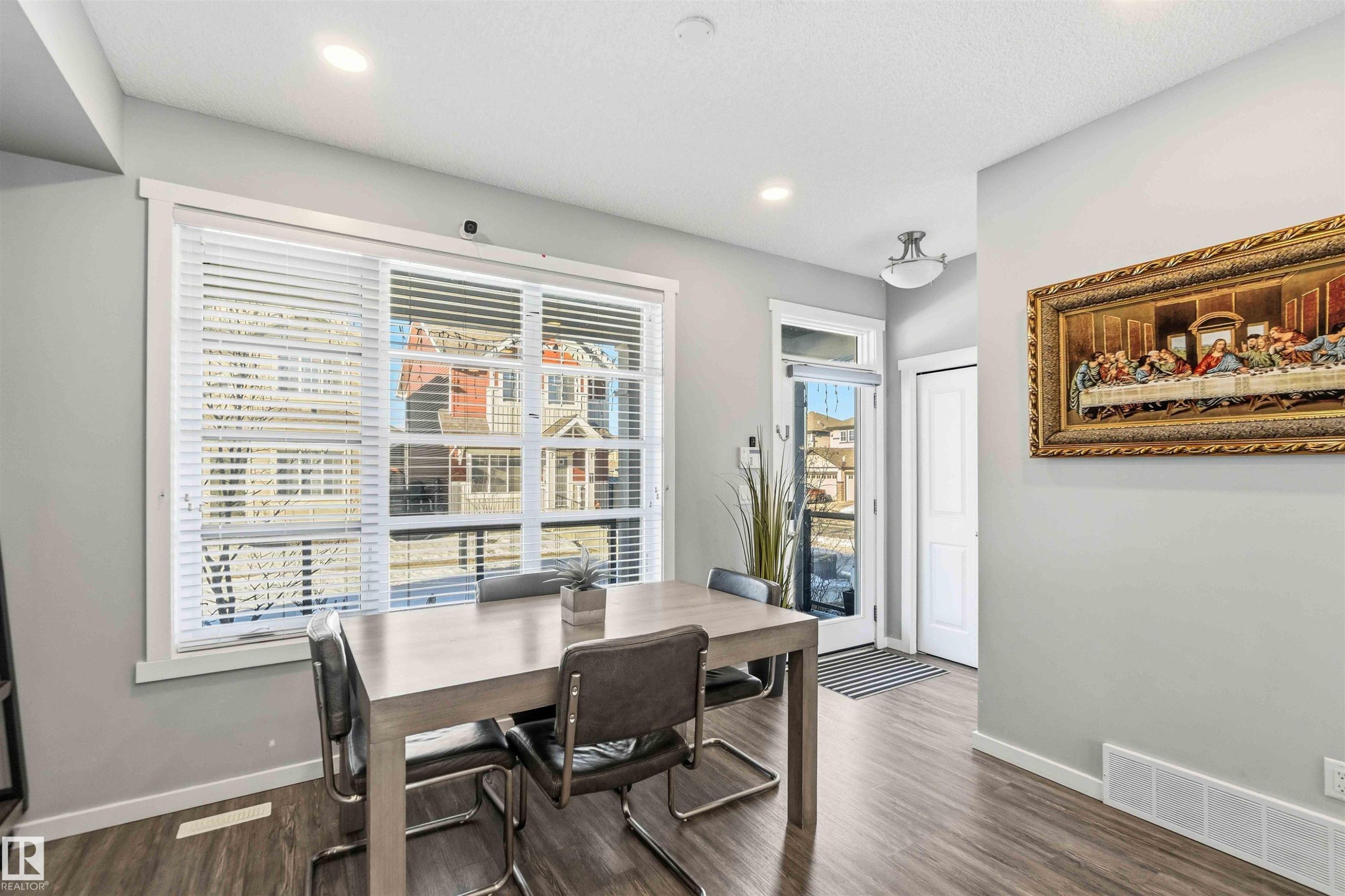 Dining area with dark wood-type flooring and recessed lighting - 1908 25 Street, Edmonton, AB - Indoor Photo Showing Dining Room