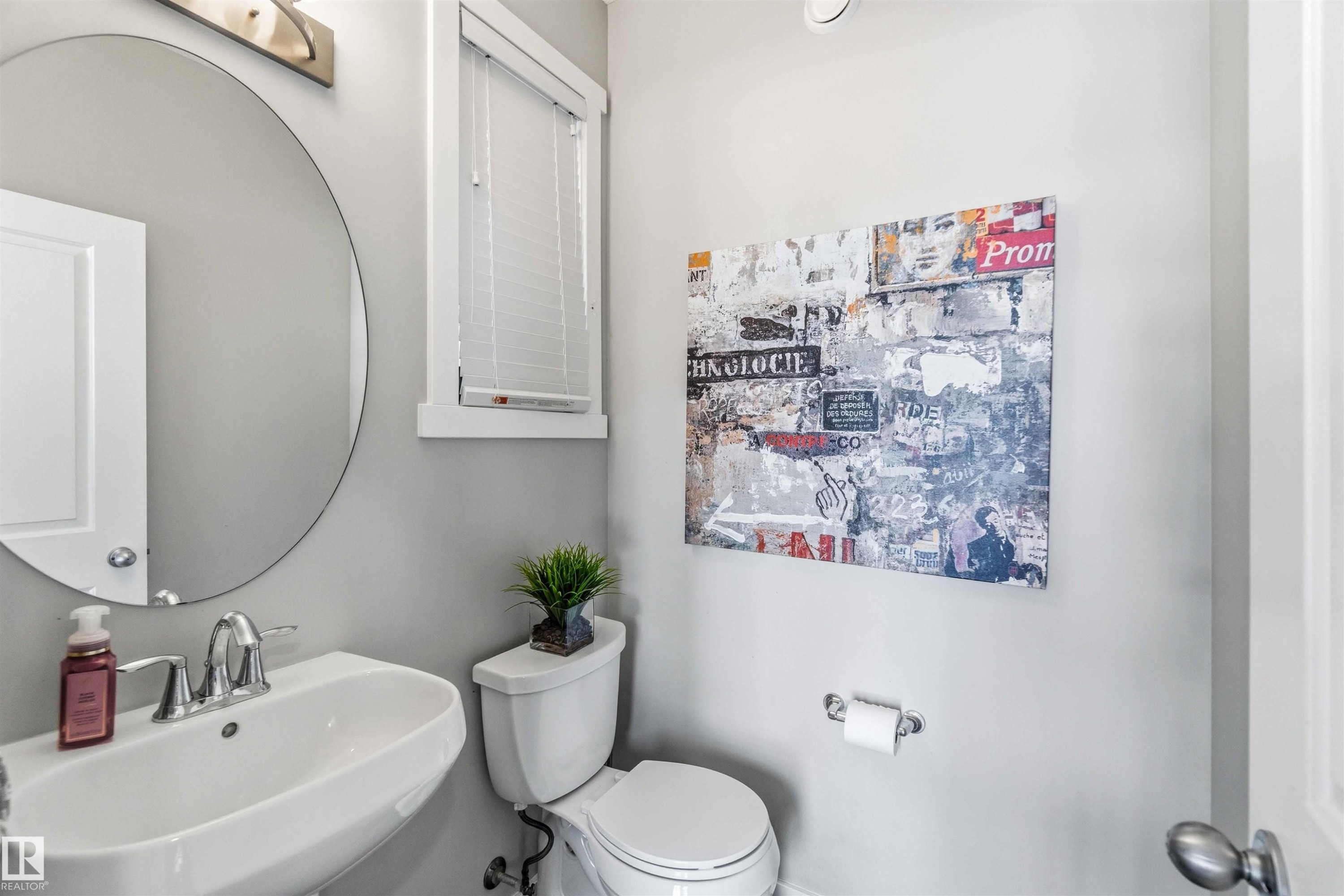 Half bath with toilet and a sink - 1908 25 Street, Edmonton, AB - Indoor Photo Showing Bathroom