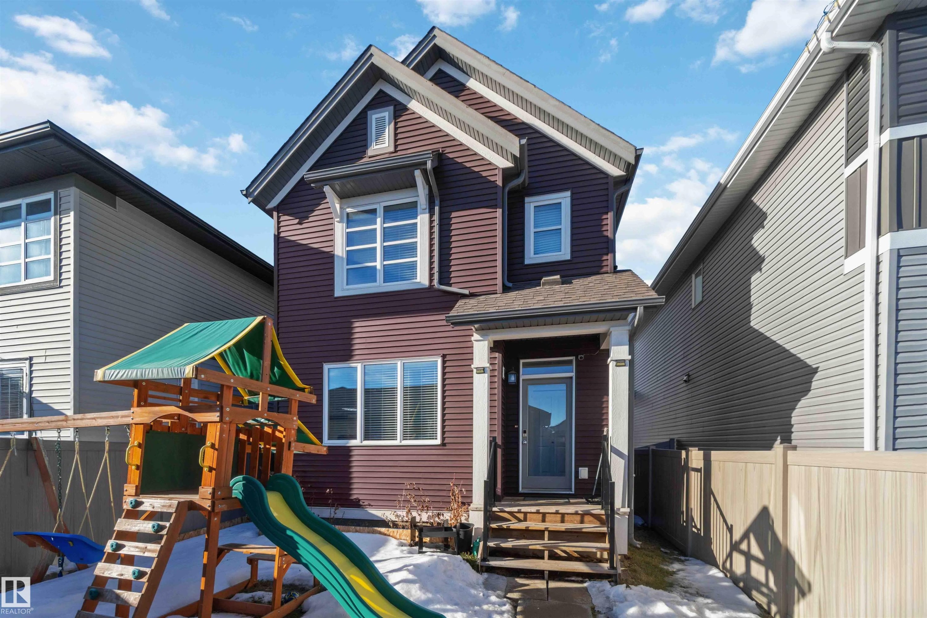 View of front of home with a playground and roof with shingles - 1908 25 Street, Edmonton, AB - Outdoor