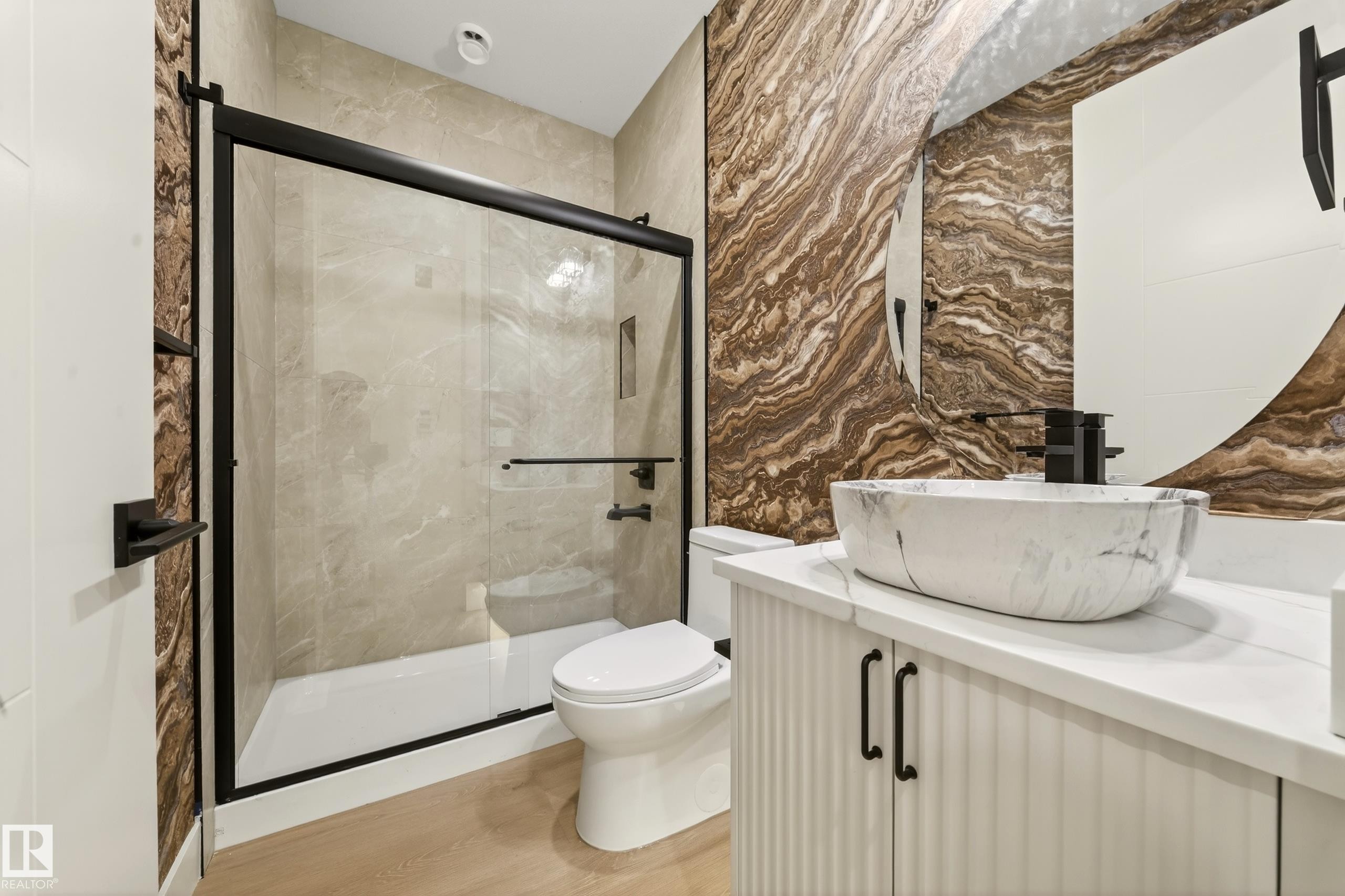 Bathroom with vanity, light wood-type flooring, and a shower stall - 8924 Mayday Way, Edmonton, AB