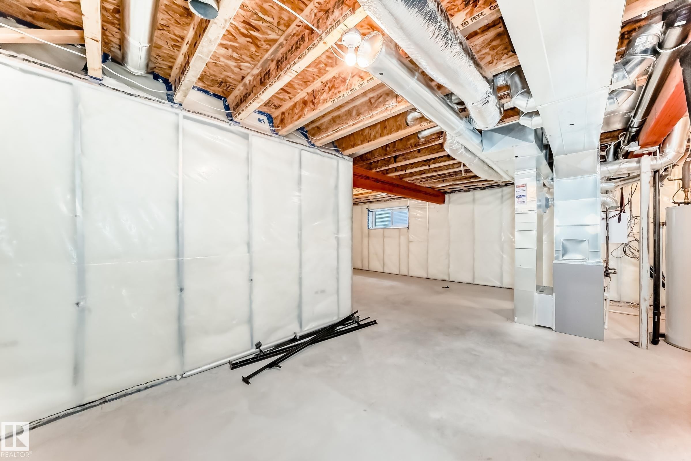 Basement featuring heating unit and water heater - 17926 62A Street, Edmonton, AB - Indoor Photo Showing Basement