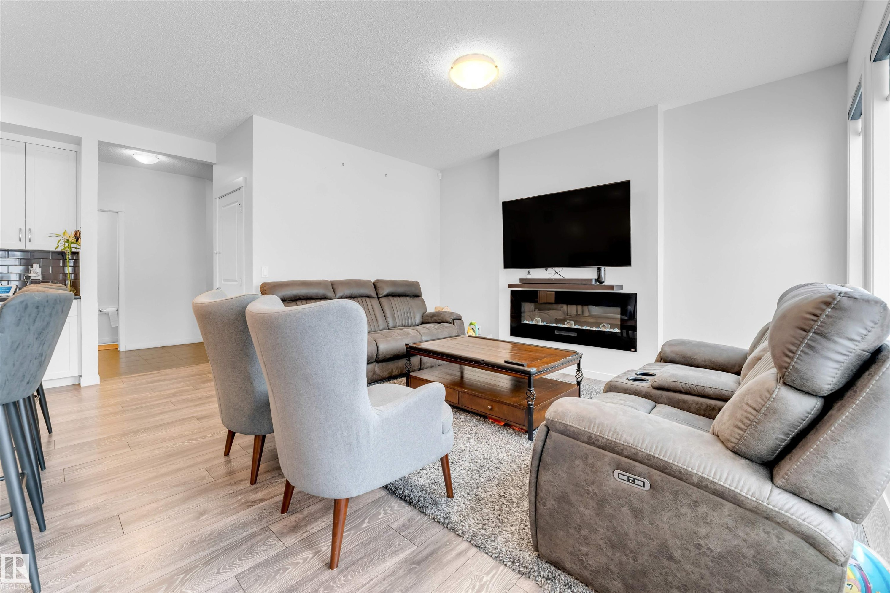 933 Mcconachie Boulevard, Edmonton, AB - Indoor Photo Showing Living Room With Fireplace
