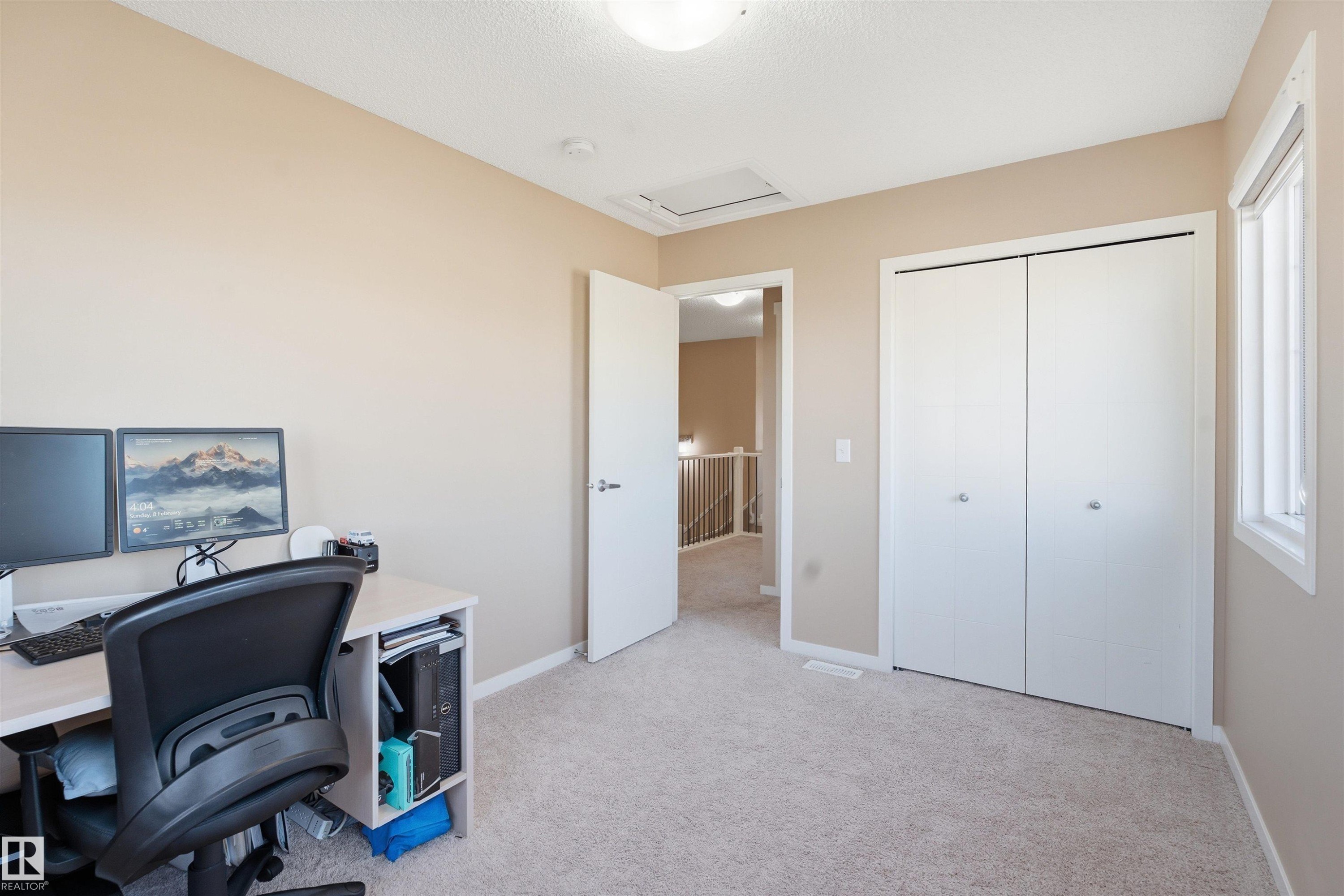 Home office with light colored carpet and attic access - 5003 Andison Close, Edmonton, AB - Indoor Photo Showing Office
