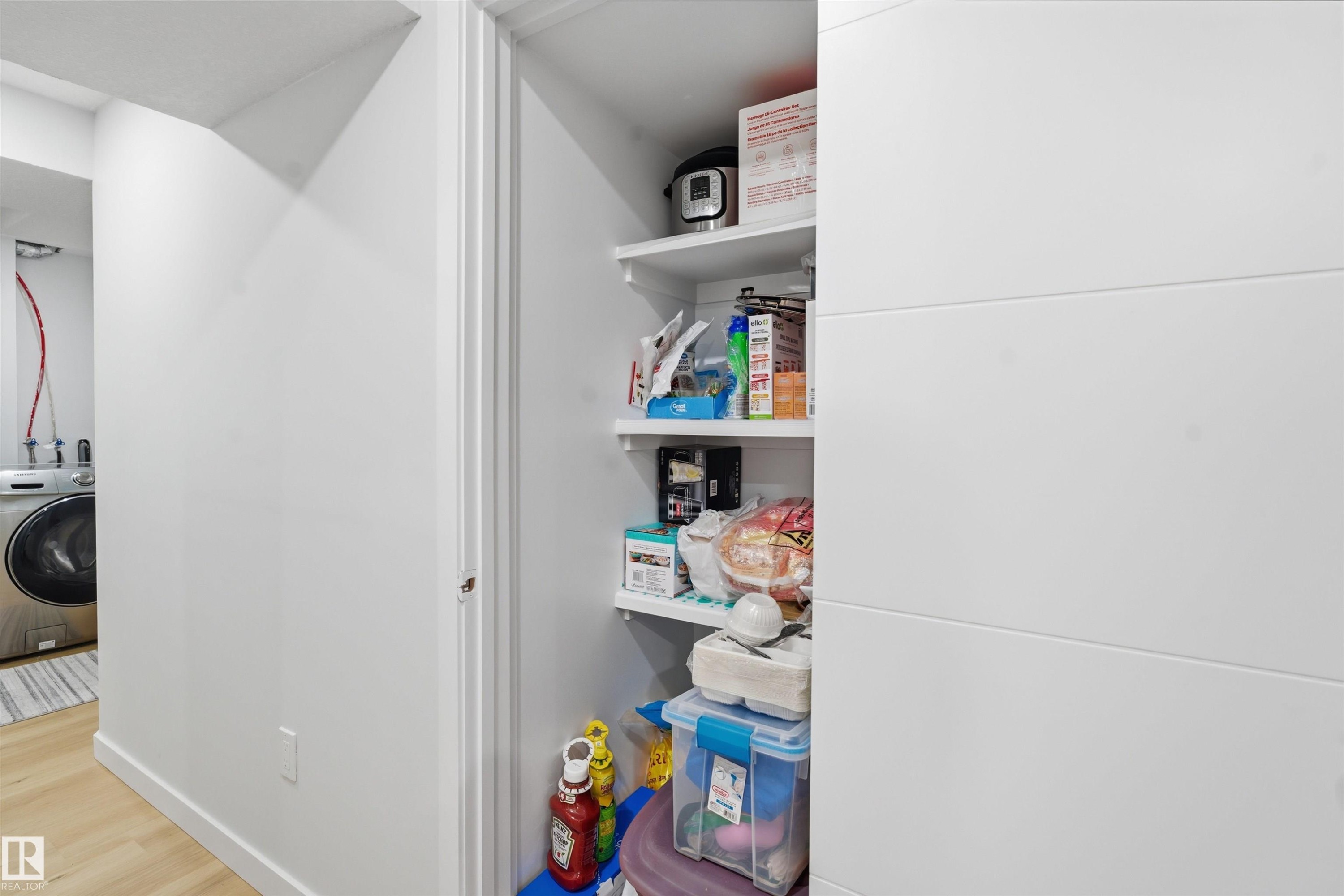 Storage area with washer / dryer - 5003 Andison Close, Edmonton, AB - Indoor