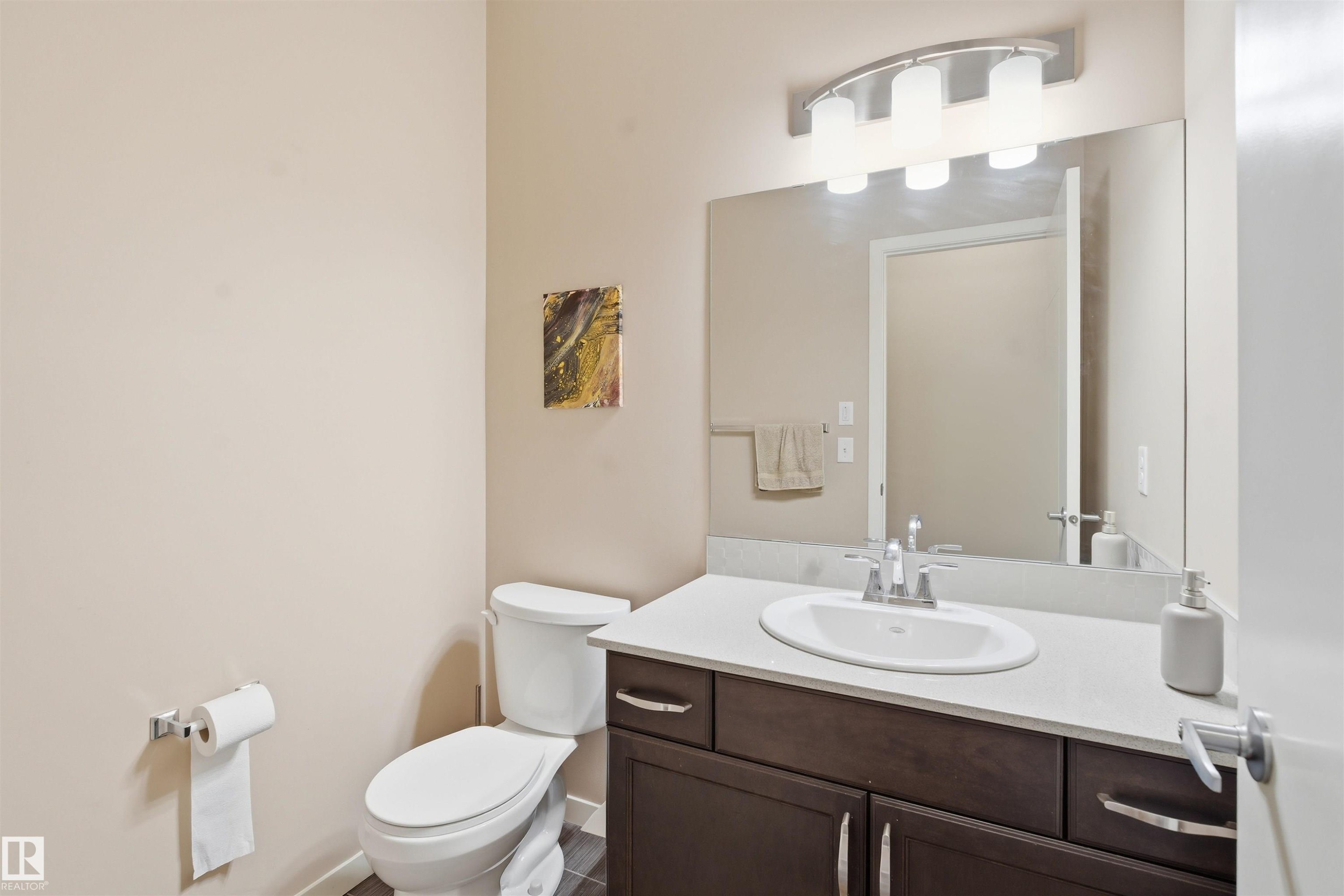 Bathroom with vanity and toilet - 5003 Andison Close, Edmonton, AB - Indoor Photo Showing Bathroom