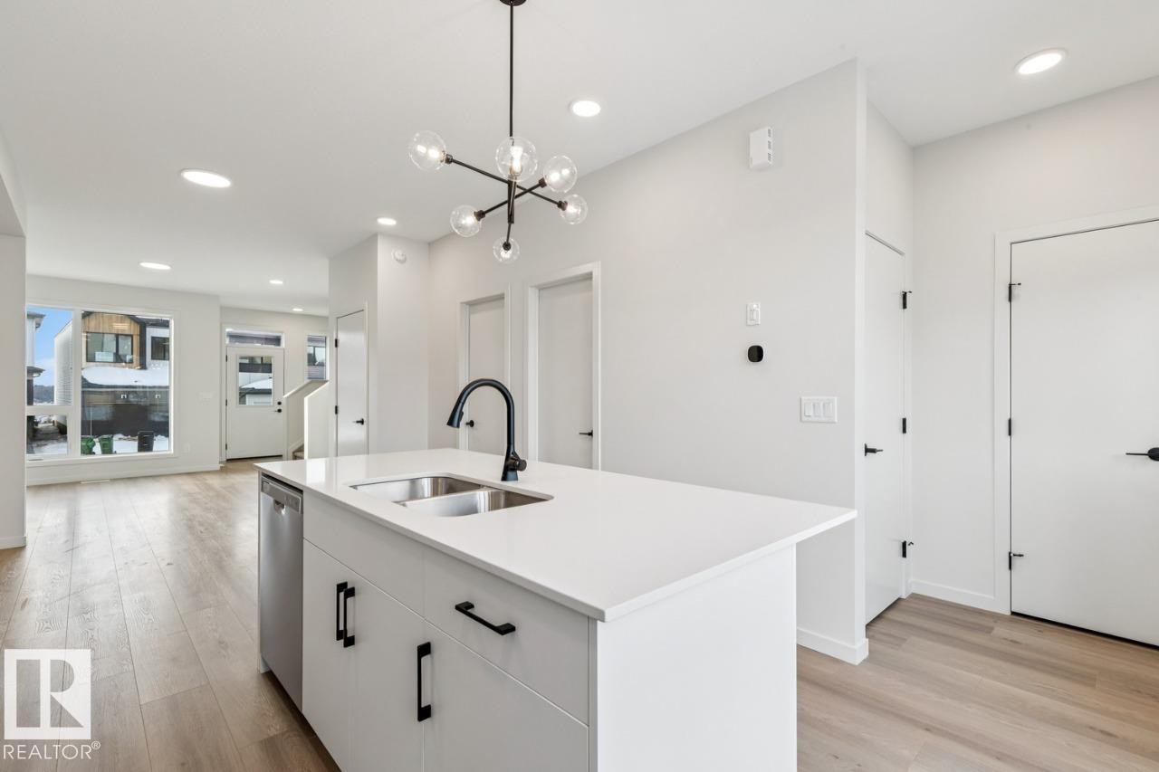 7460 Klapstein Crescent, Edmonton, AB - Indoor Photo Showing Kitchen With Double Sink