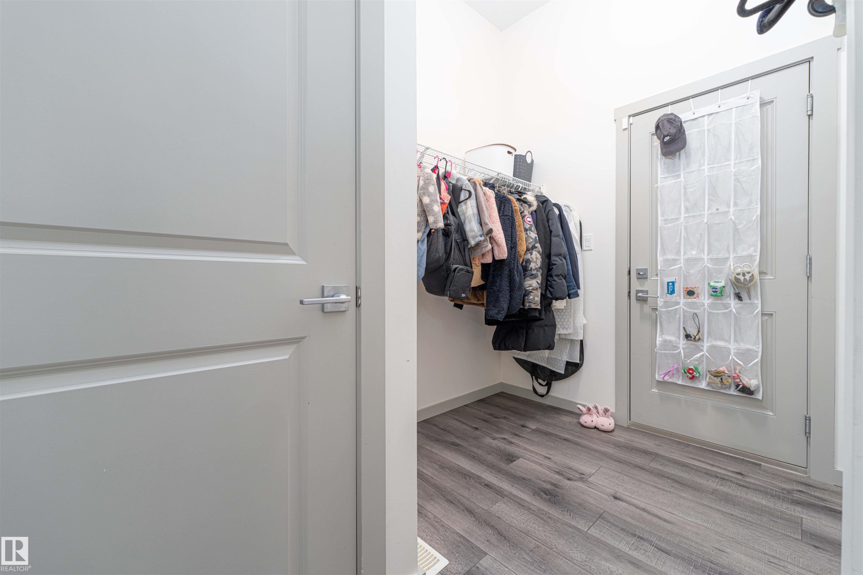 Walk in closet with wood finished floors - 2330 Kelly Circle, Edmonton, AB - Indoor With Storage
