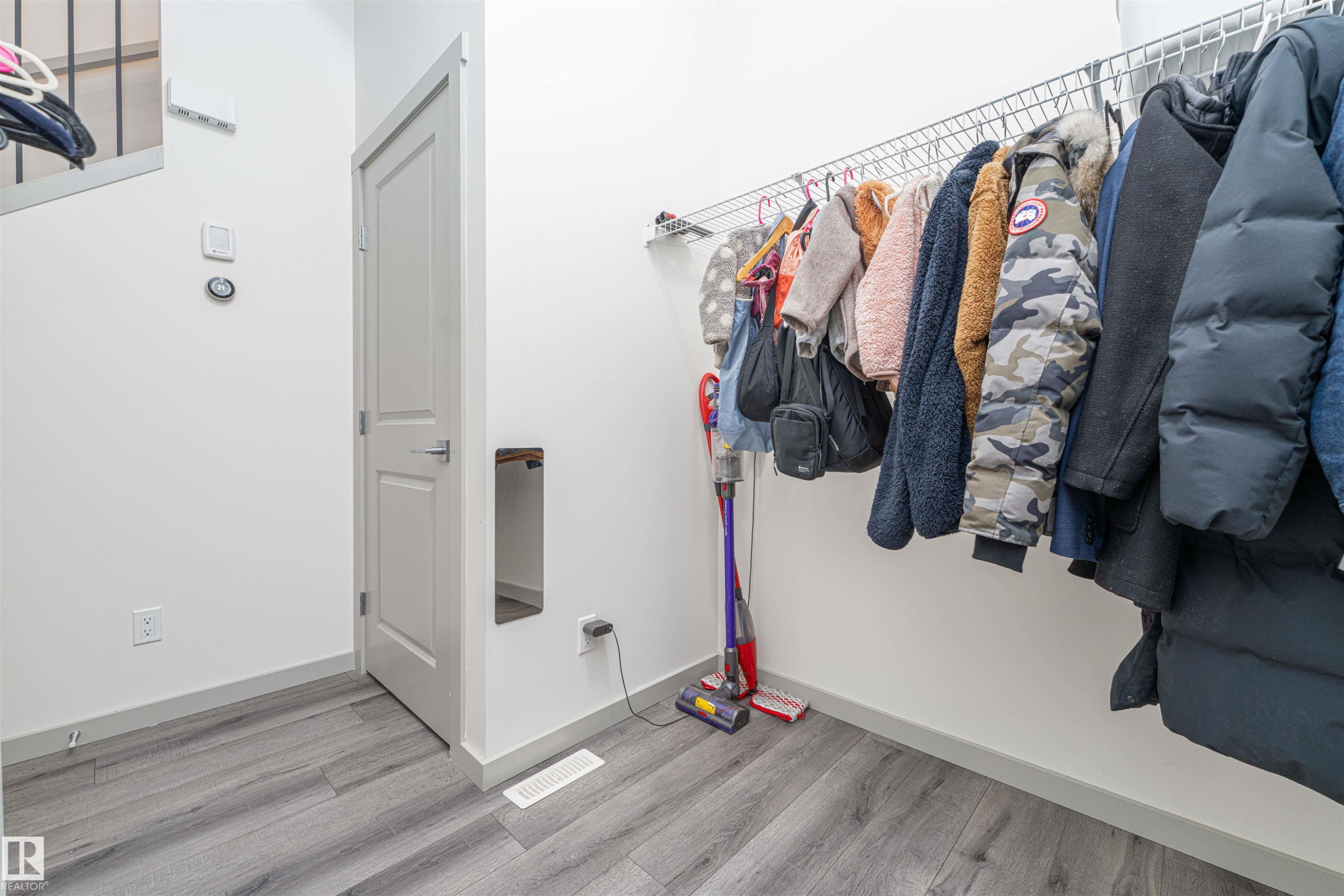 Walk in closet with light wood-style floors - 2330 Kelly Circle, Edmonton, AB - Indoor With Storage