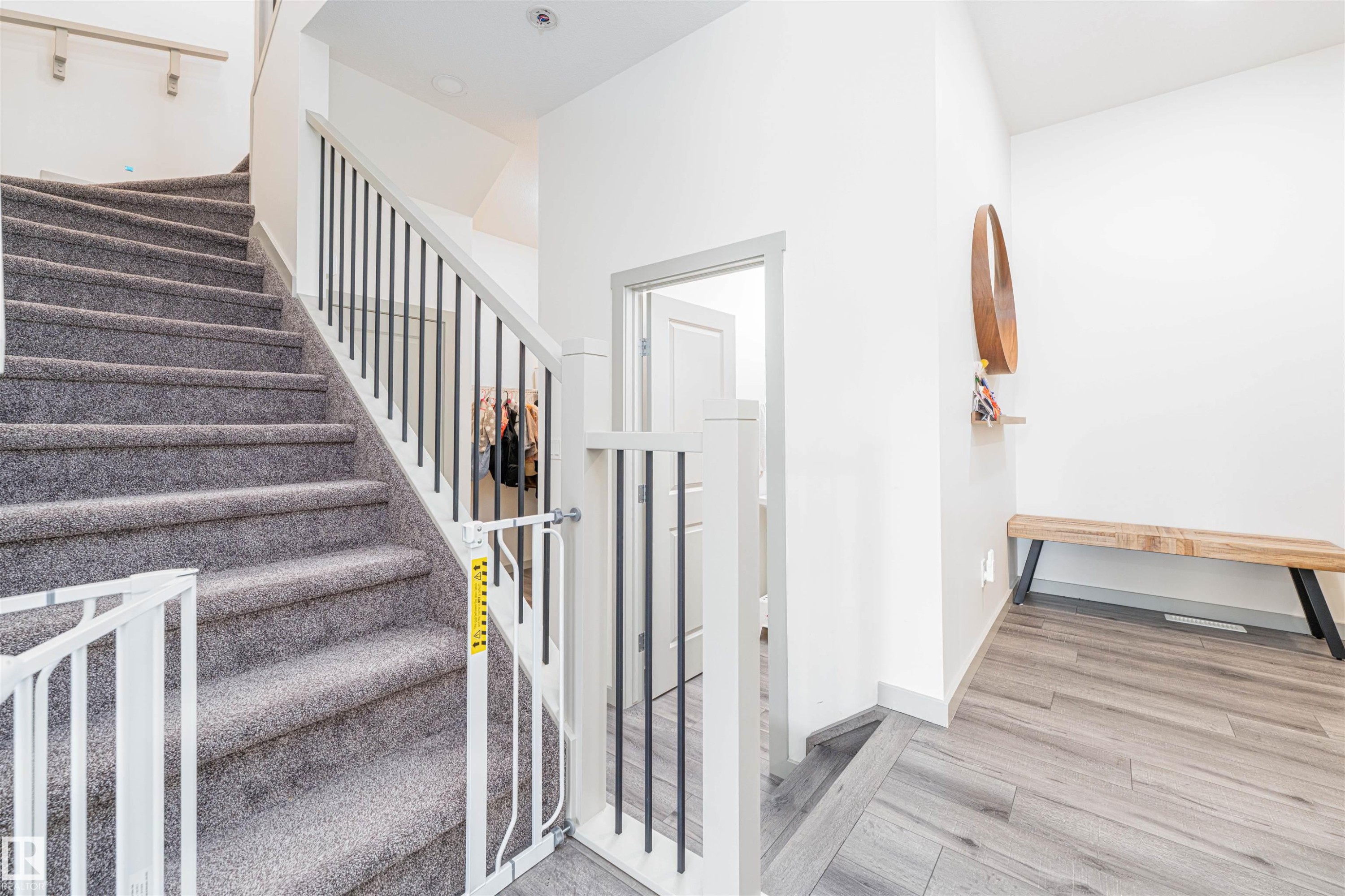 Stairs with baseboards and wood finished floors - 2330 Kelly Circle, Edmonton, AB - Indoor Photo Showing Other Room