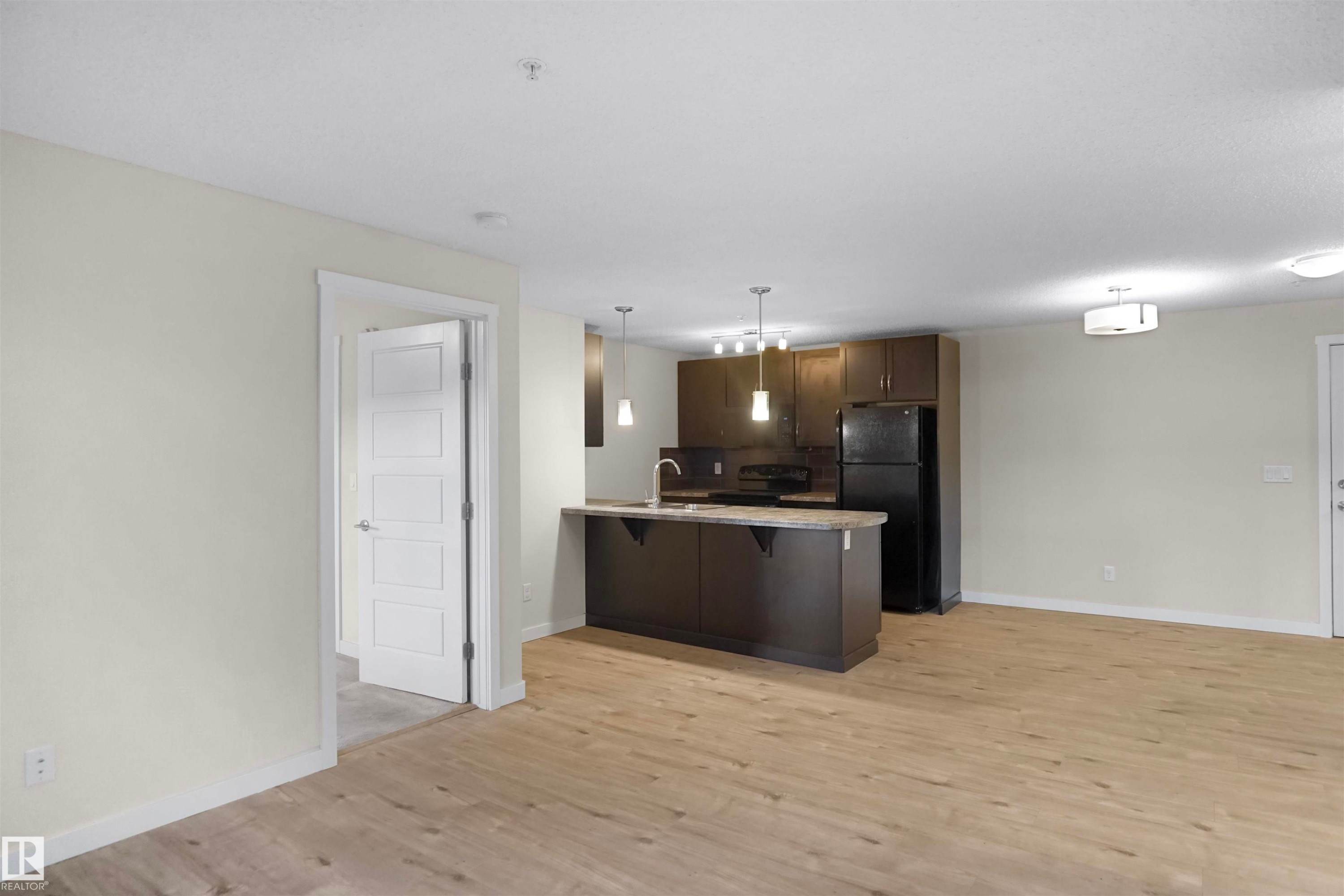 335 6076 Schonsee Way, Edmonton, AB - Indoor Photo Showing Kitchen