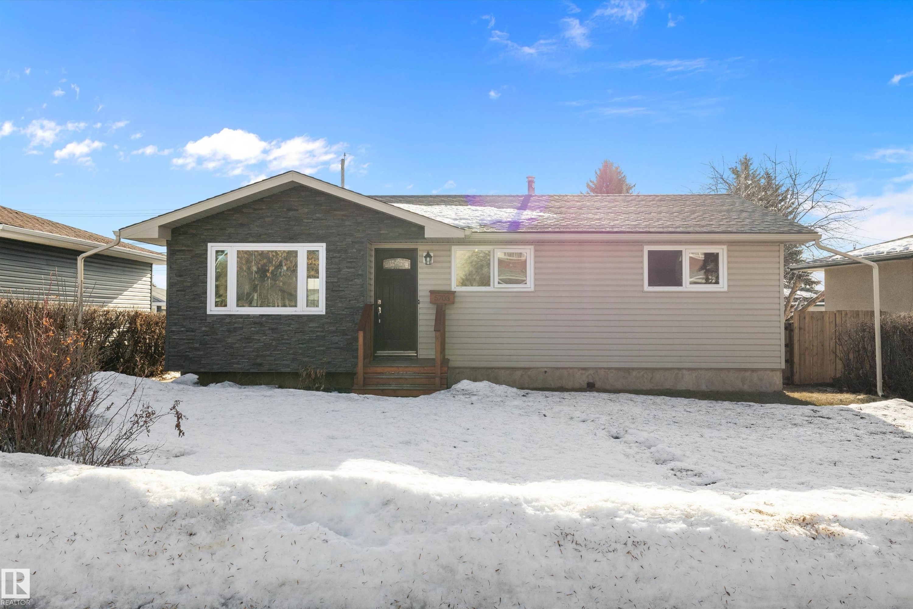 View of front of property with stone siding - 5703 143 Avenue, Edmonton, AB - Outdoor
