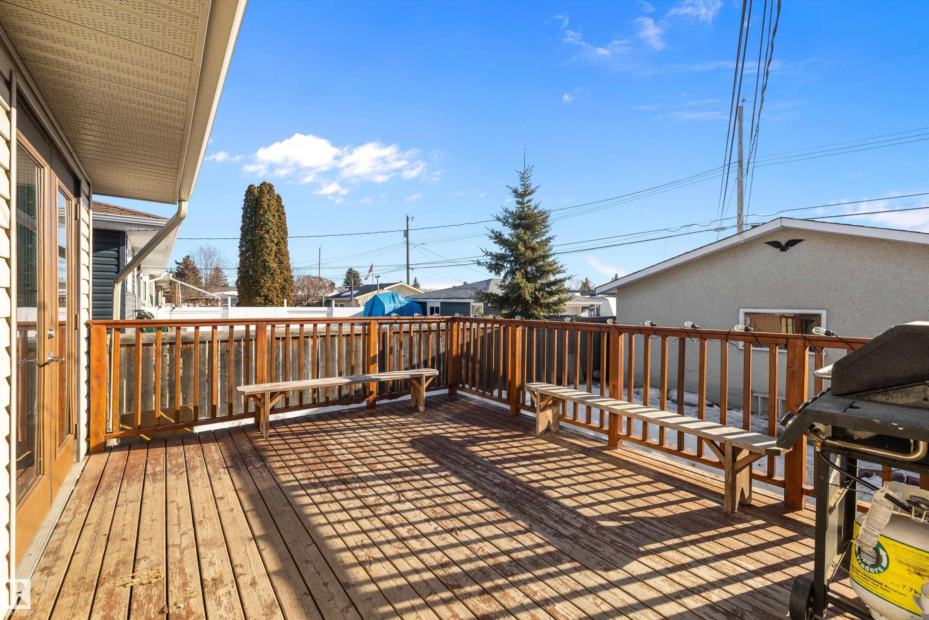 Wooden deck featuring a residential view - 5703 143 Avenue, Edmonton, AB - Outdoor With Deck Patio Veranda With Exterior