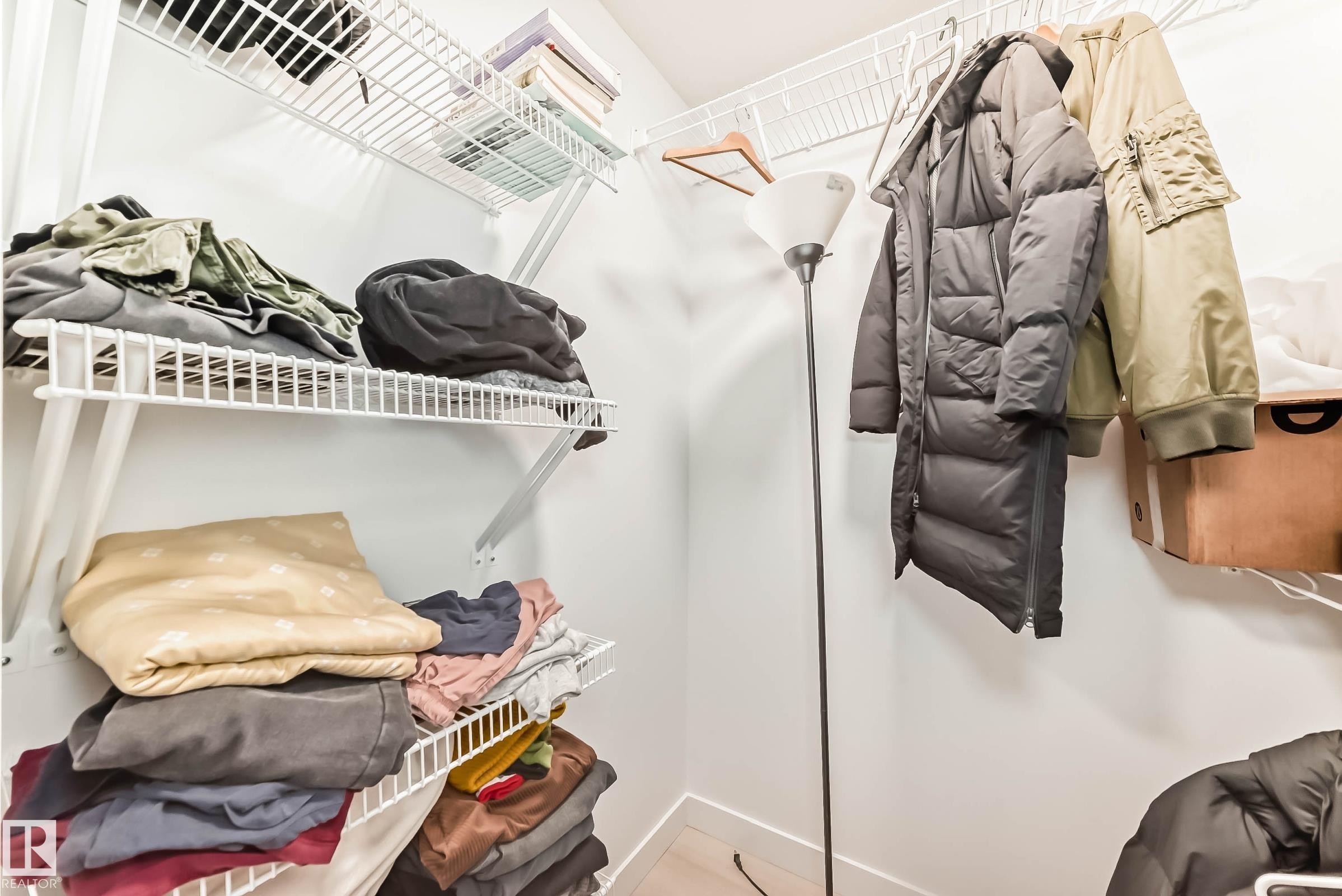 View of walk in closet - 7719 Getty Wynd, Edmonton, AB - Indoor With Storage
