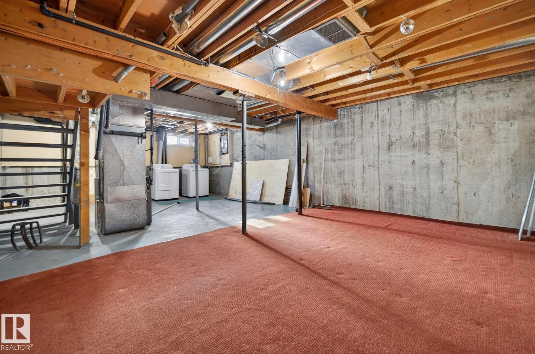 Basement with heating unit and washer and dryer - 9969 171 Ave, Edmonton, AB - Indoor Photo Showing Basement