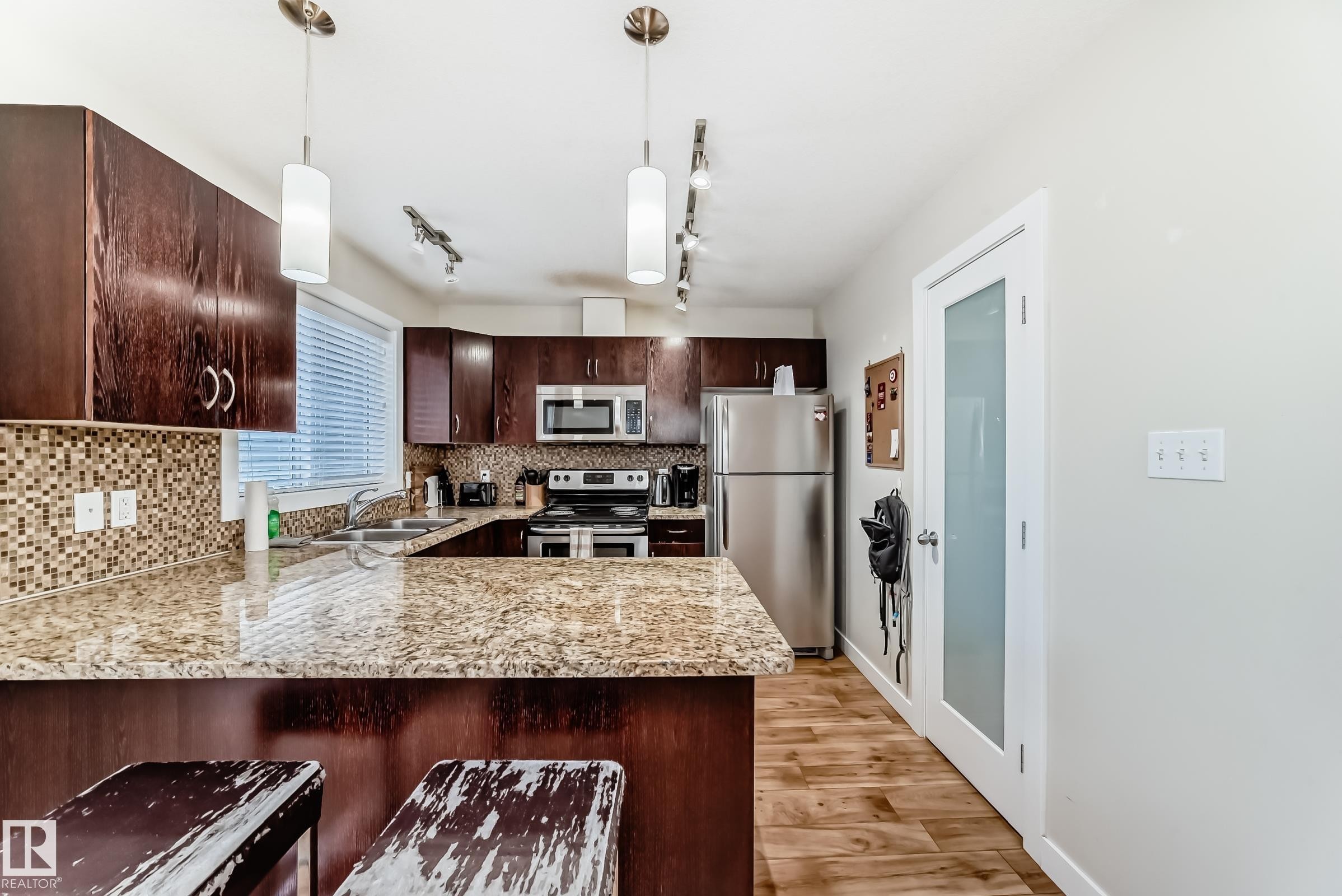 2 4950 Terwillegar Common, Edmonton, AB - Indoor Photo Showing Kitchen With Stainless Steel Kitchen With Double Sink With Upgraded Kitchen