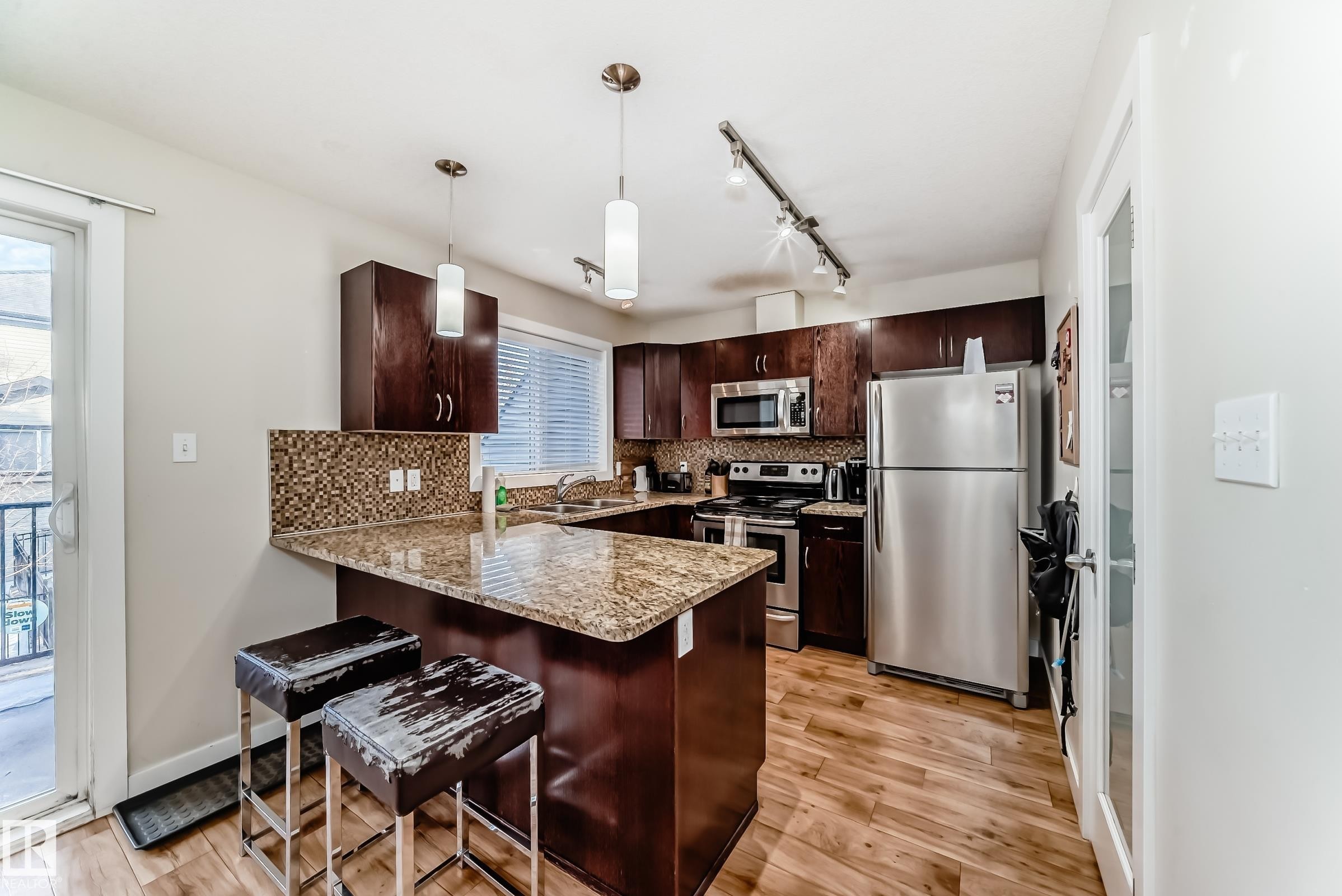 2 4950 Terwillegar Common, Edmonton, AB - Indoor Photo Showing Kitchen With Stainless Steel Kitchen With Double Sink