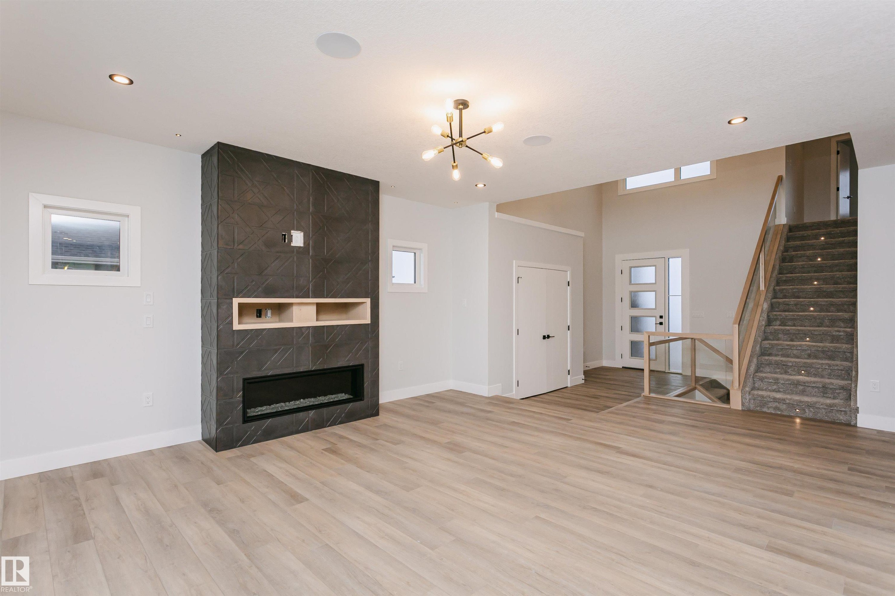 162 Edgewater Circle, Leduc, AB - Indoor Photo Showing Living Room With Fireplace