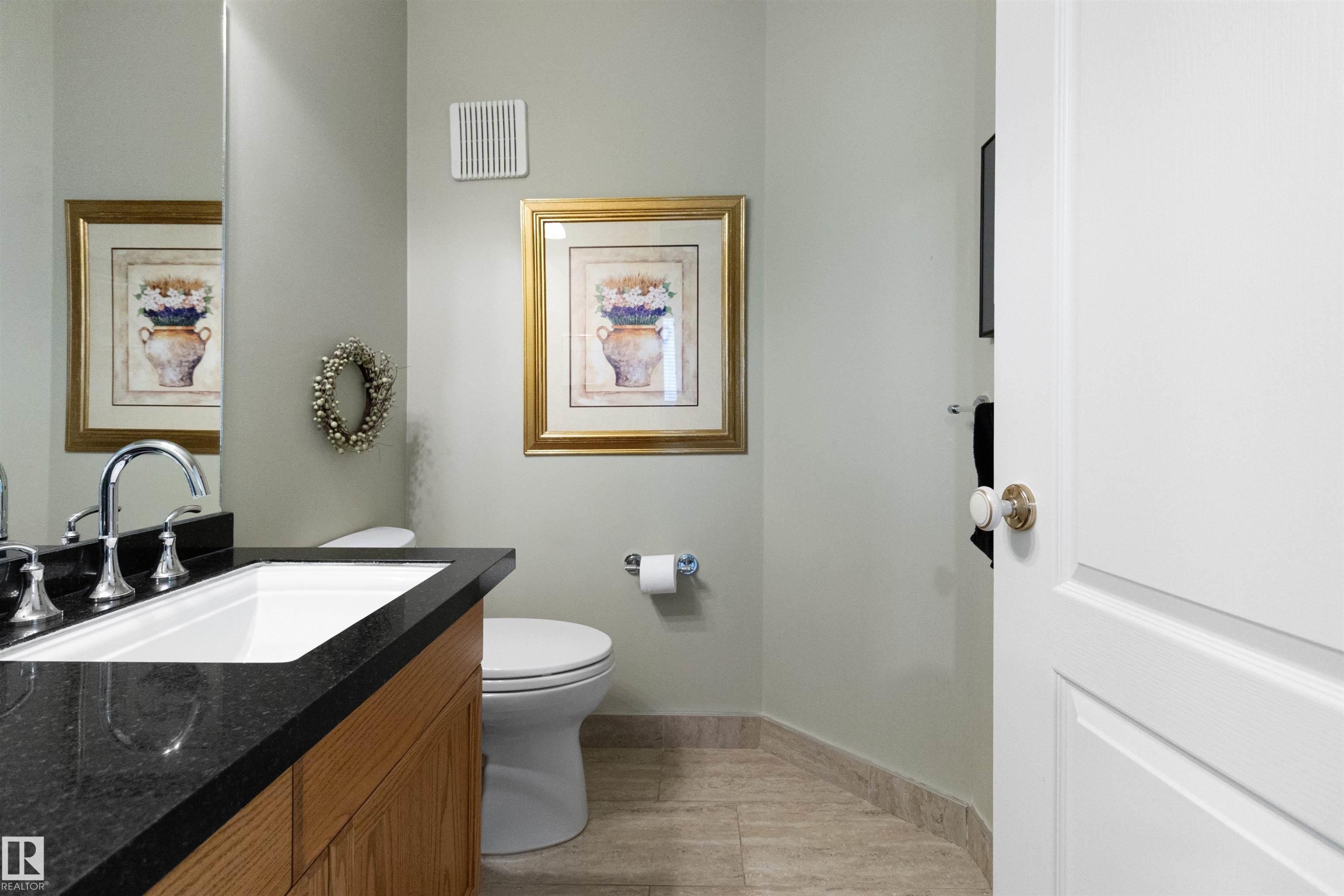 Half bathroom featuring vanity and toilet - 519 Buchanan Road, Edmonton, AB - Indoor Photo Showing Bathroom