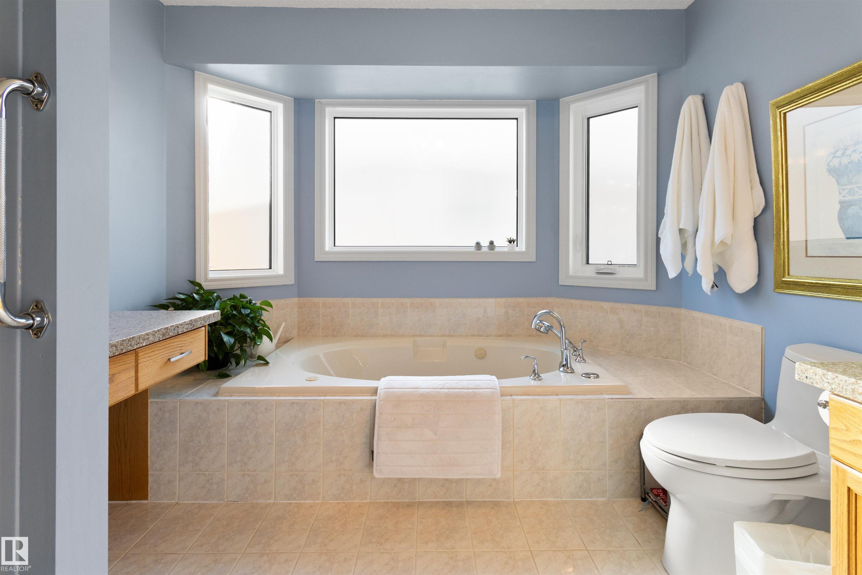 Full bathroom with vanity, a garden tub, and light tile patterned floors - 519 Buchanan Road, Edmonton, AB - Indoor Photo Showing Bathroom