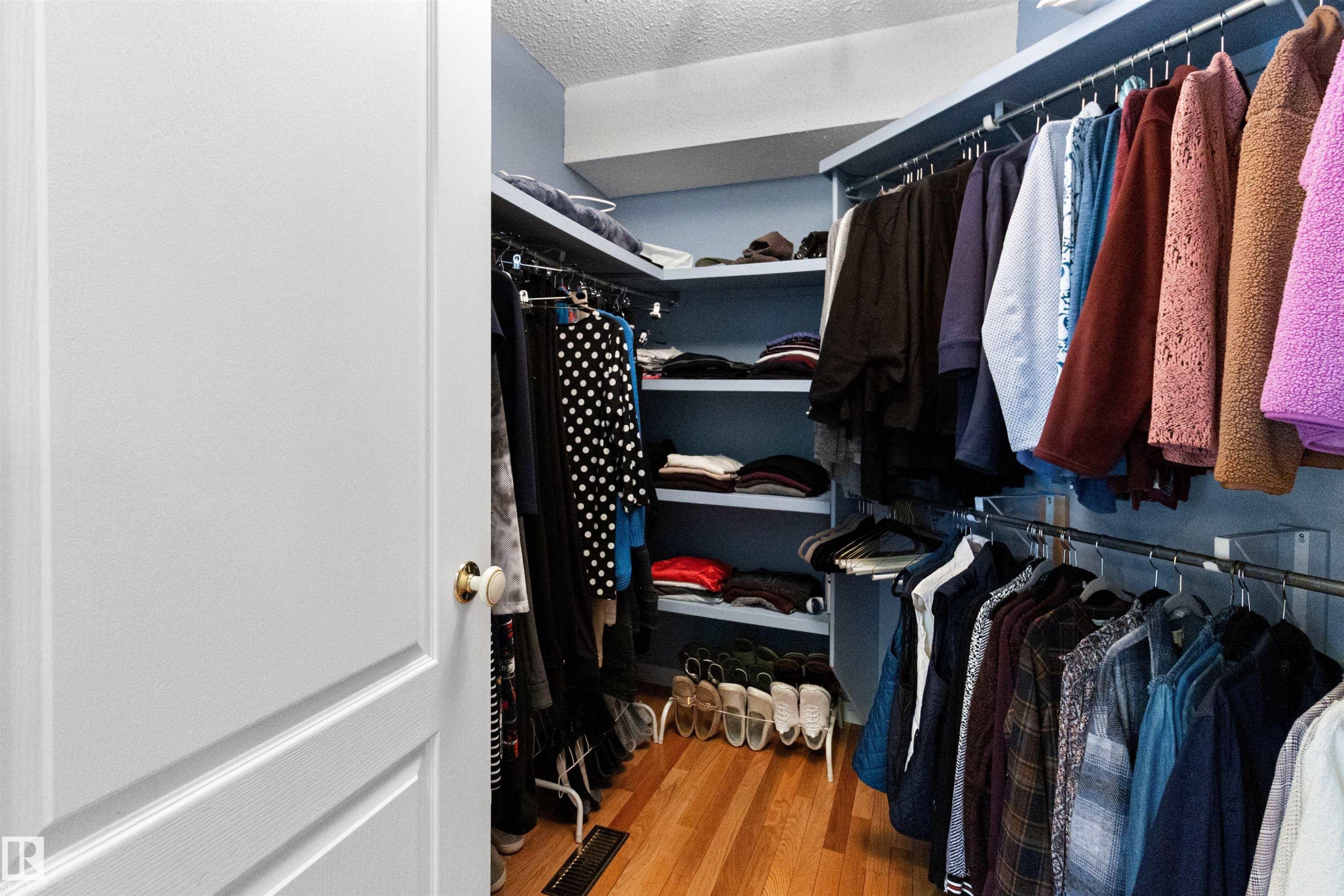 Walk in closet with light wood finished floors - 519 Buchanan Road, Edmonton, AB - Indoor With Storage