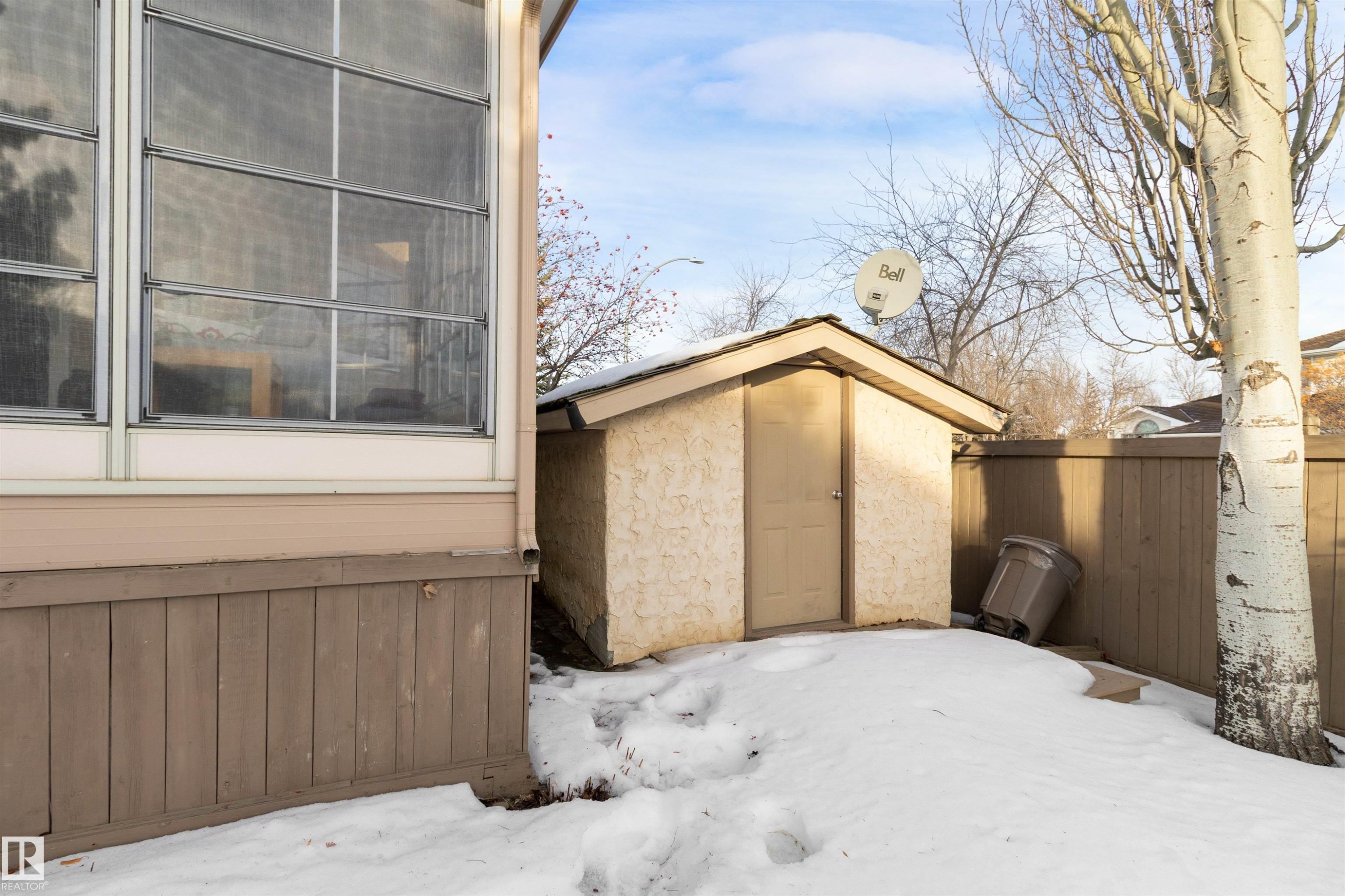 Snow covered structure featuring a storage shed - 519 Buchanan Road, Edmonton, AB - Outdoor With Exterior