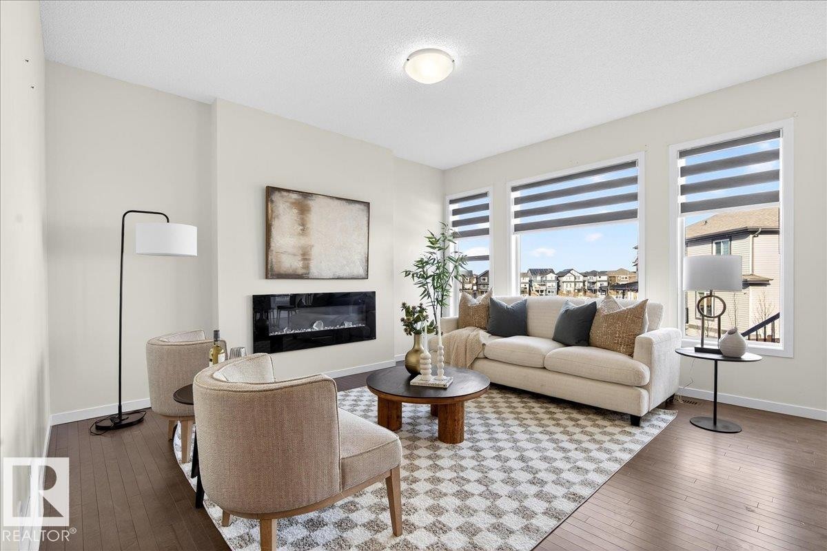 5404 22 Avenue, Edmonton, AB - Indoor Photo Showing Living Room With Fireplace