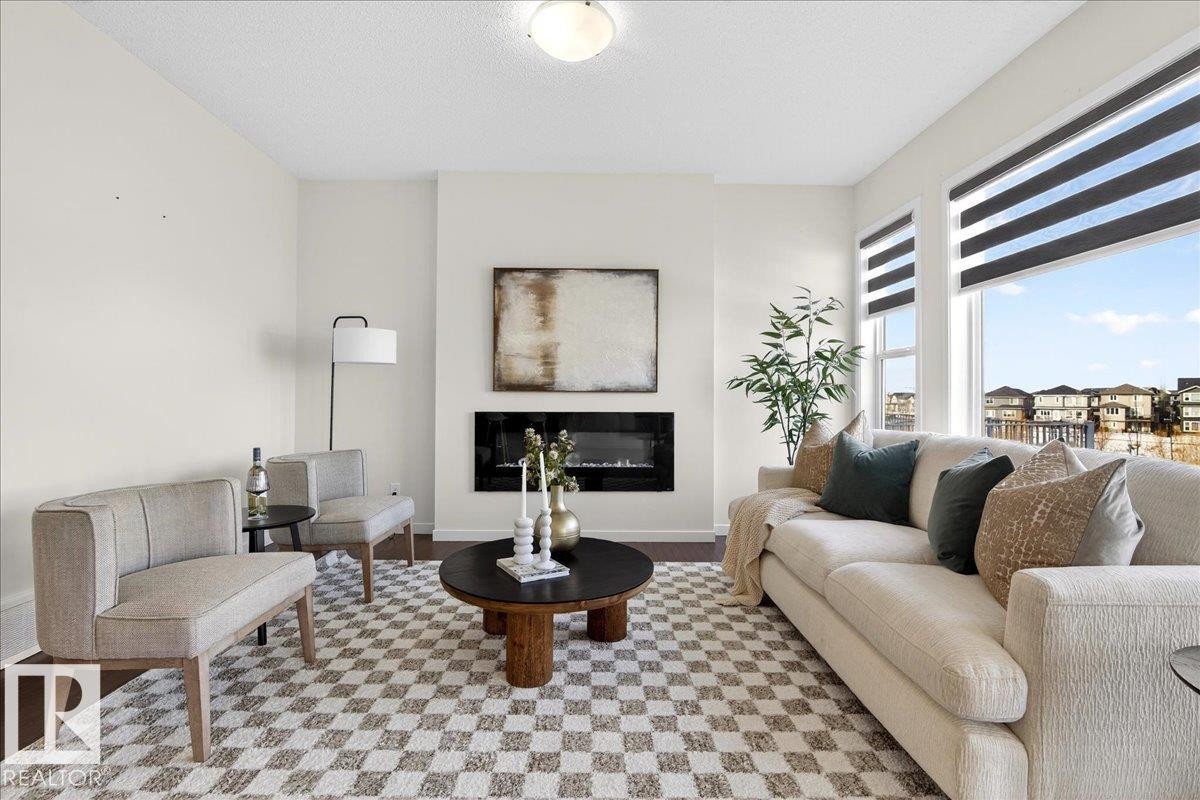5404 22 Avenue, Edmonton, AB - Indoor Photo Showing Living Room With Fireplace