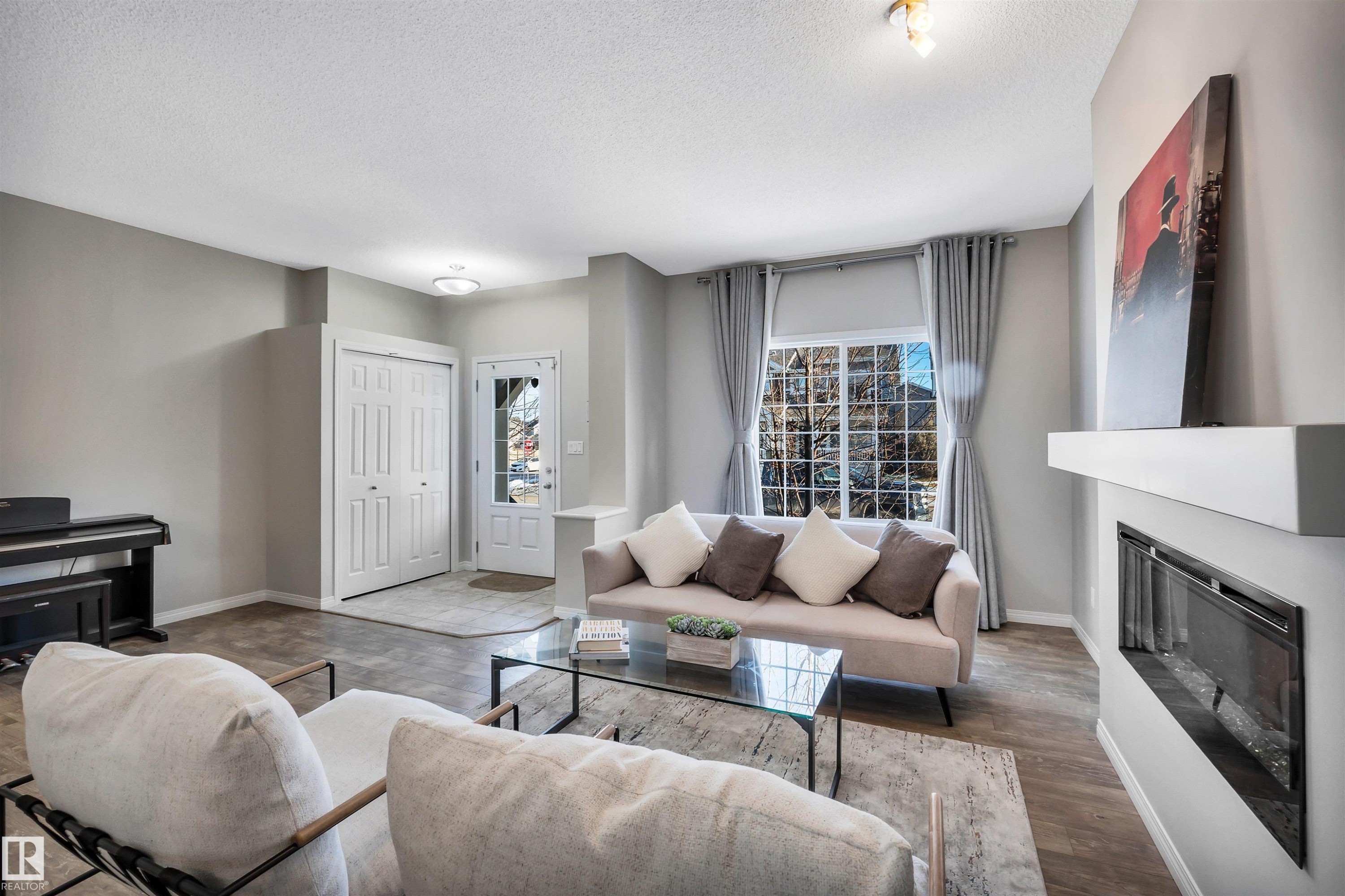 1271 Chappelle Boulevard, Edmonton, AB - Indoor Photo Showing Living Room With Fireplace