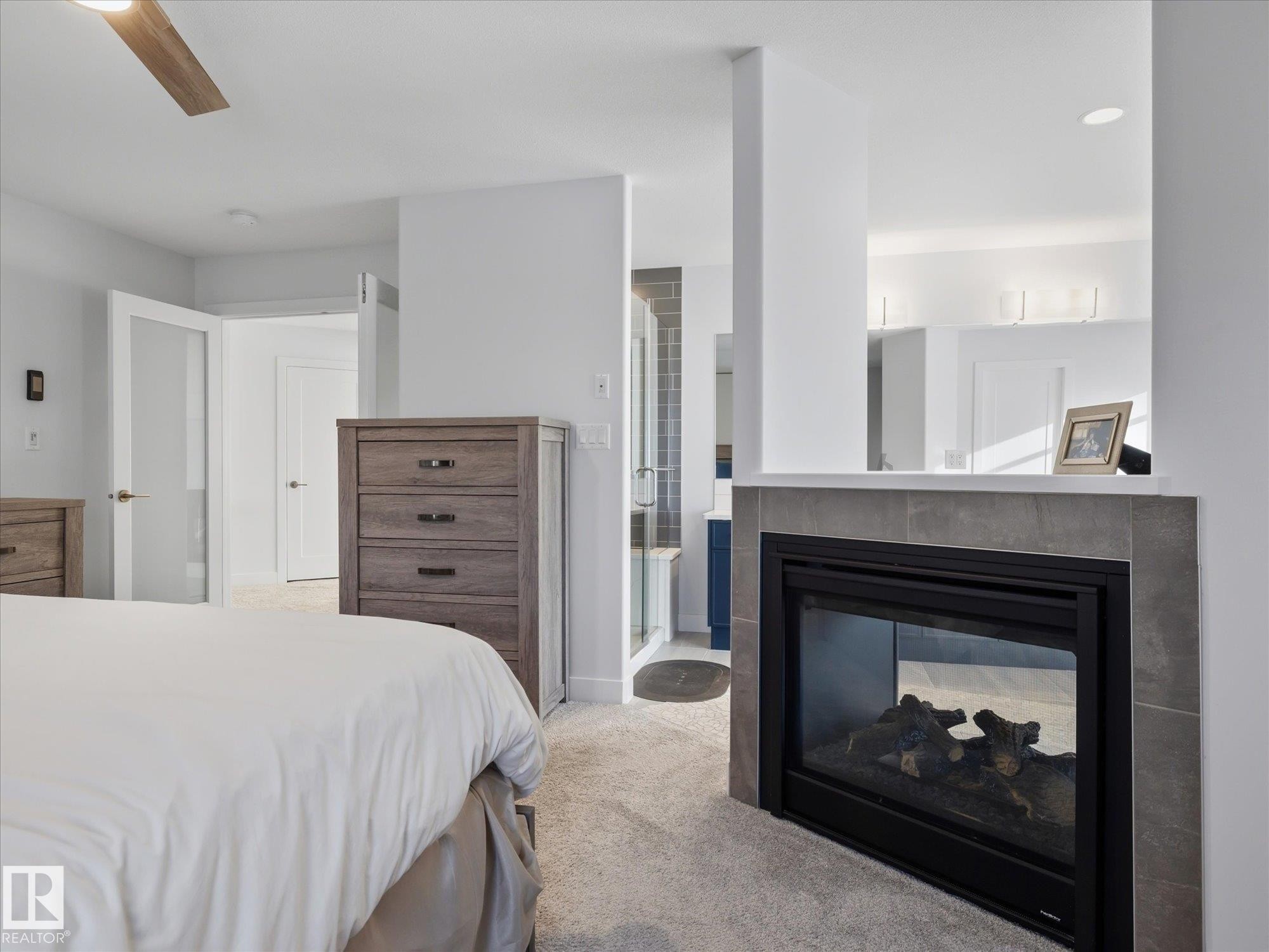 1562 Howes Place, Edmonton, AB - Indoor Photo Showing Bedroom With Fireplace